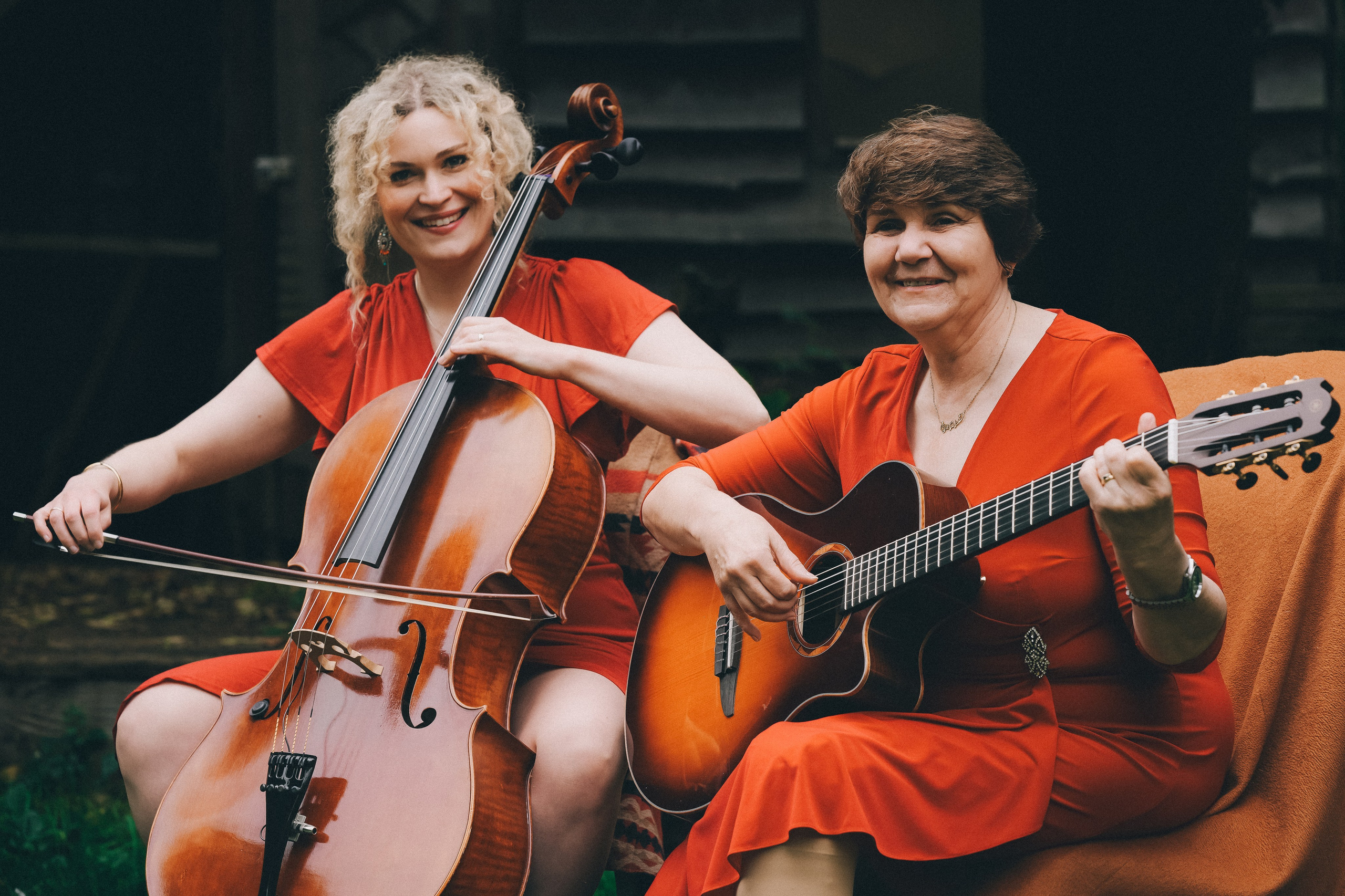 Brand storytelling photography of two musicians performing together on stage
