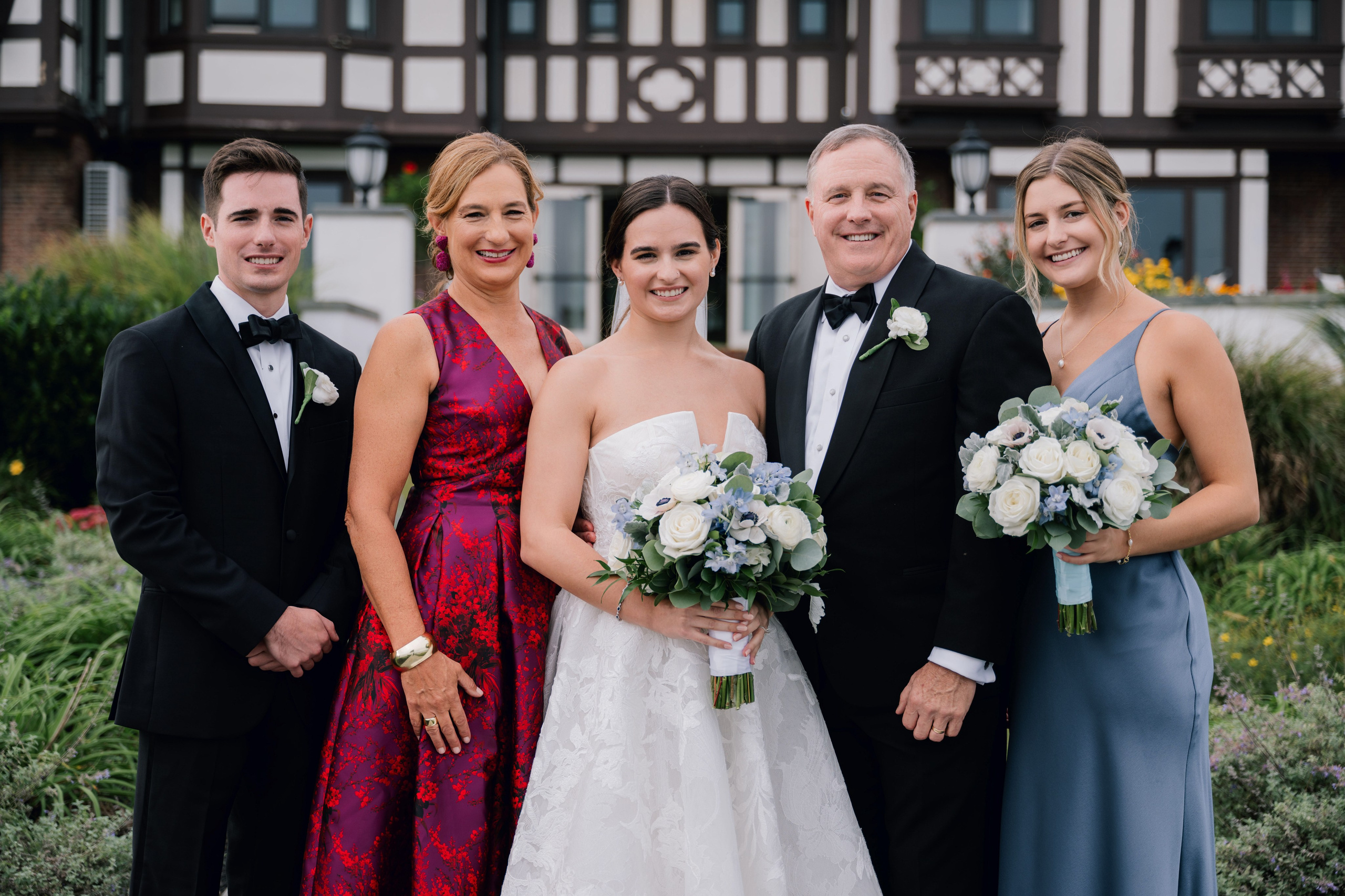 a group of people standing in front of a building