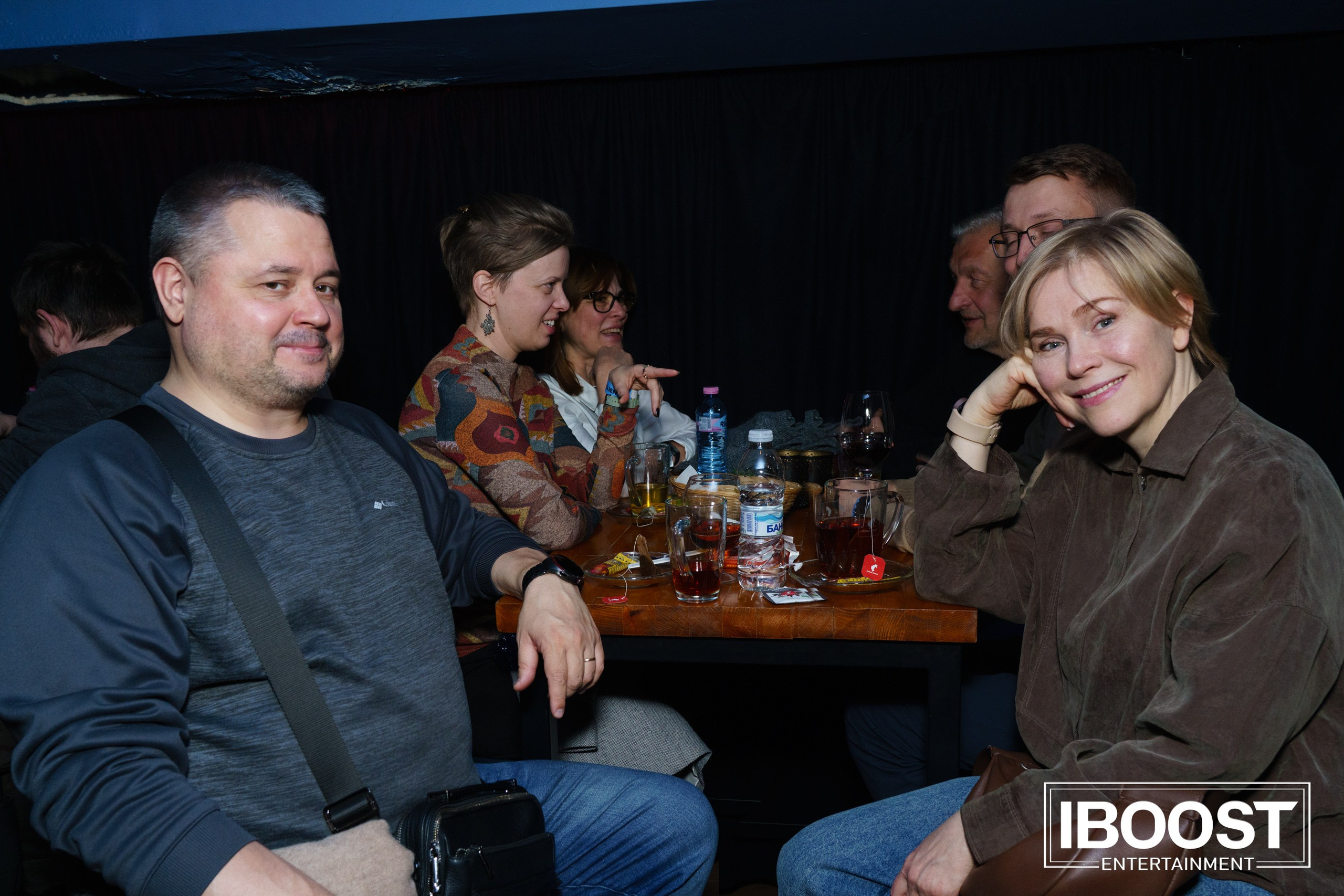Concert guests seated at a table in the audience during the Animal JazZ show in Sofia.