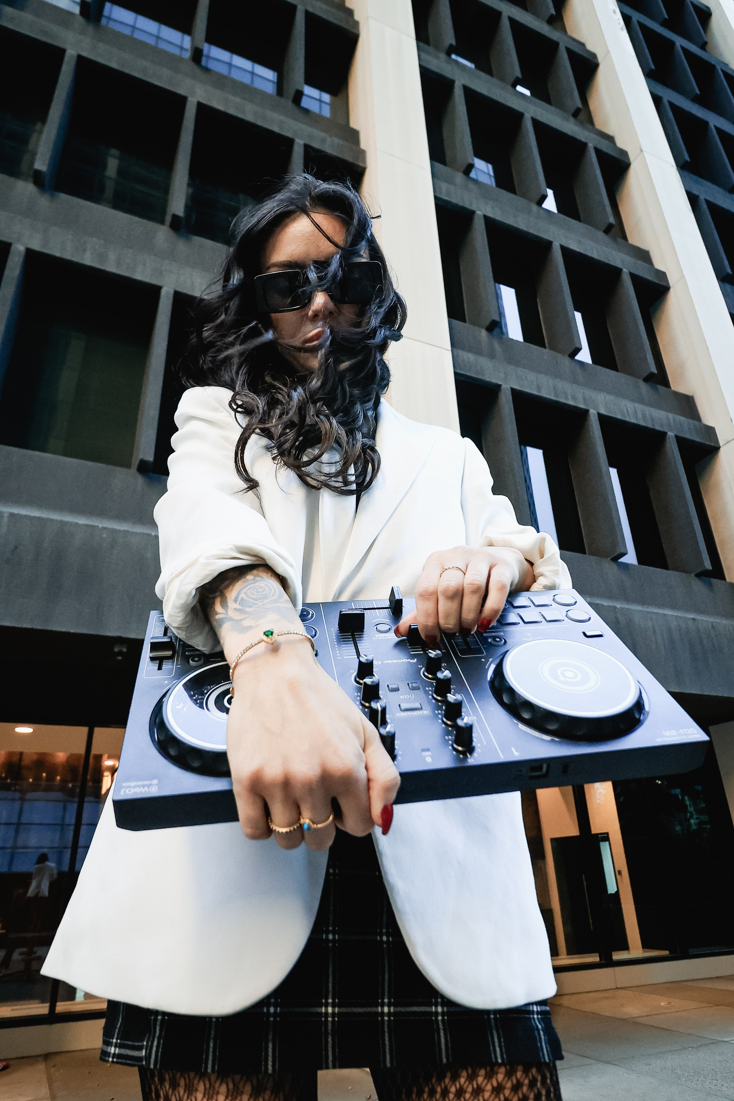 Spinning Vibes: DJ.Cloud11’s Dynamic Photoshoot in Calgary. ProFly.club — Professional aerial filming in Calgary