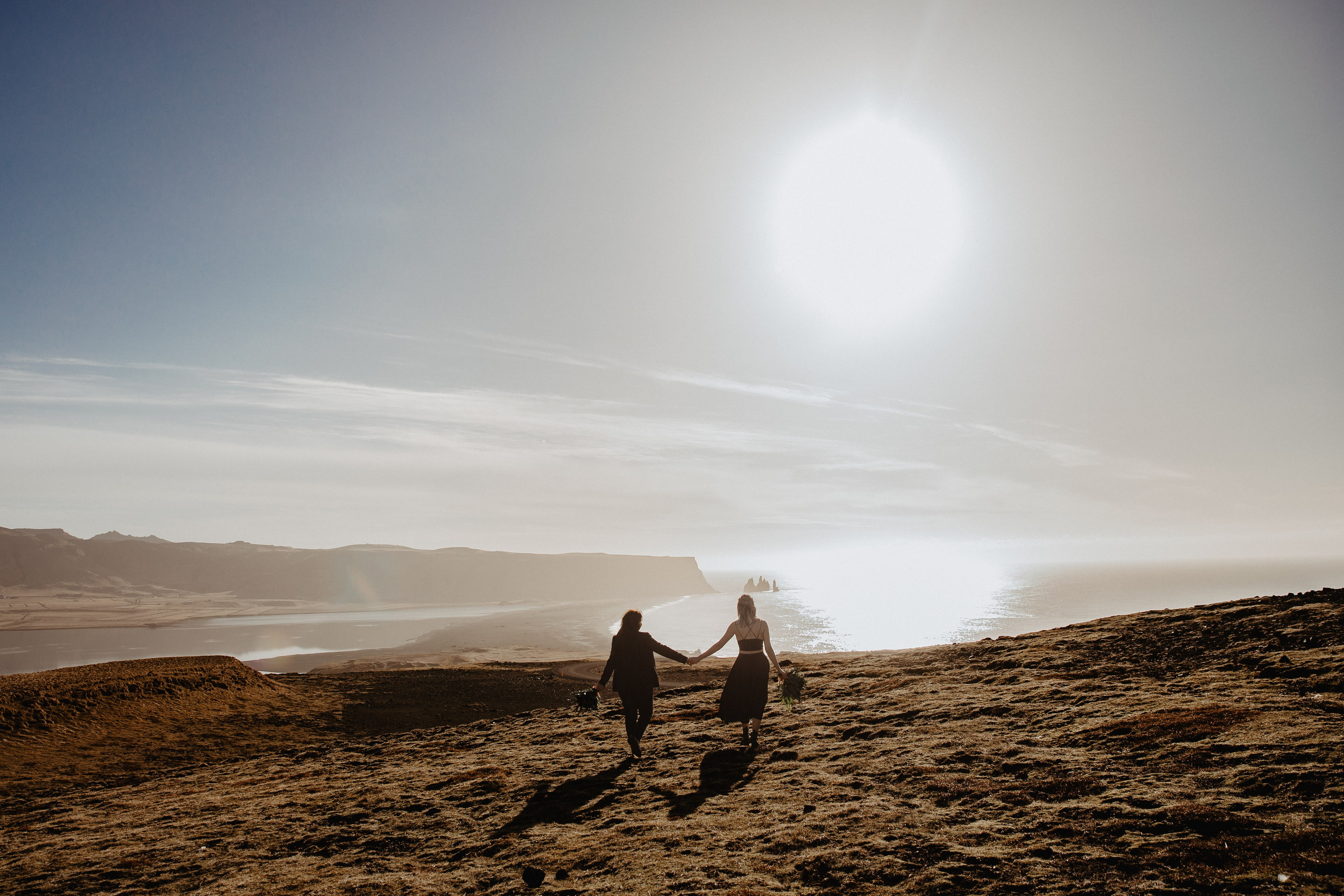 Same Sex Wedding at Iceland Black Sand Beach. Iceland elopement photographer & videographer