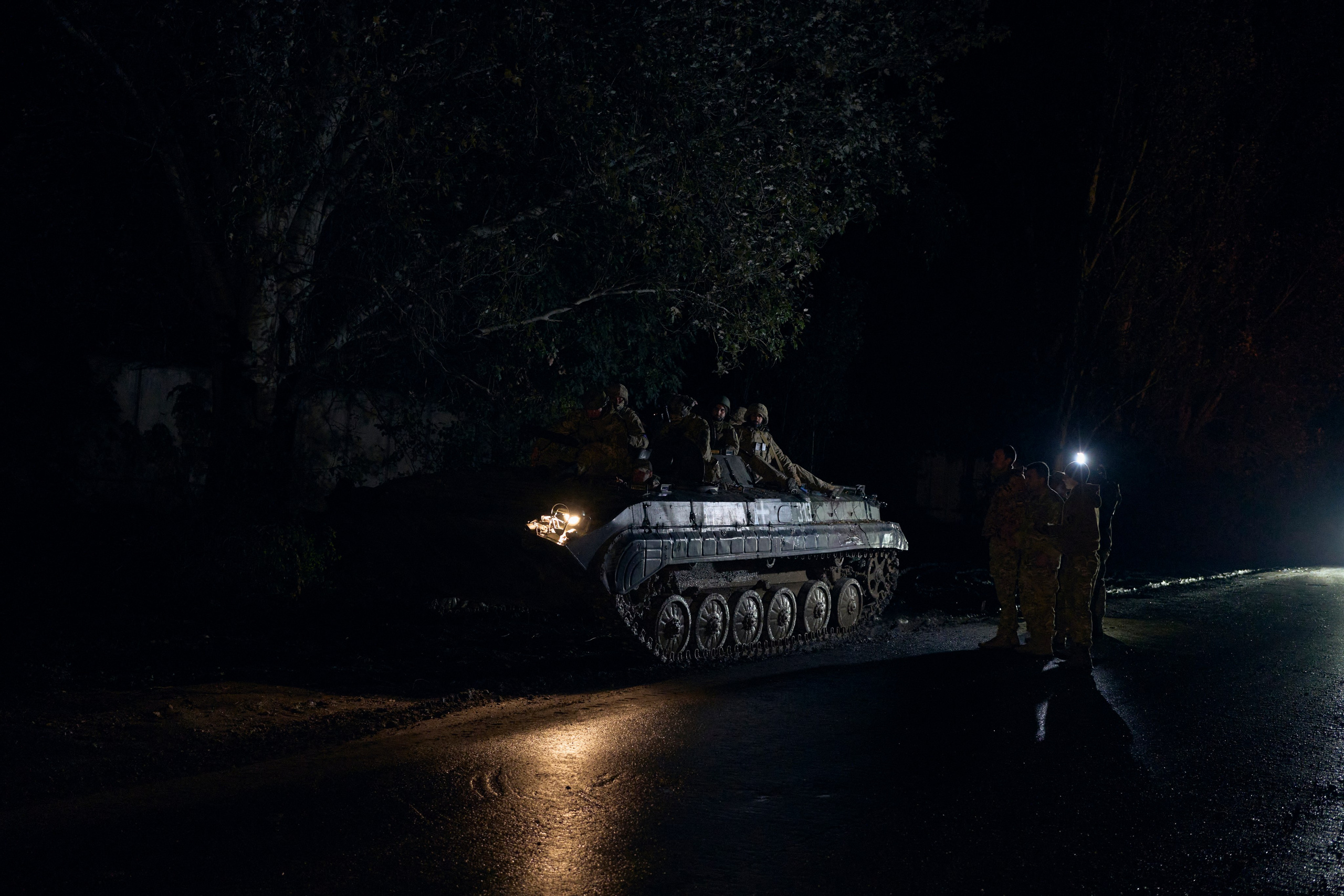 Armored personnel carrier with soldiers of 22nd Mechanized brigade before moving to the positions.