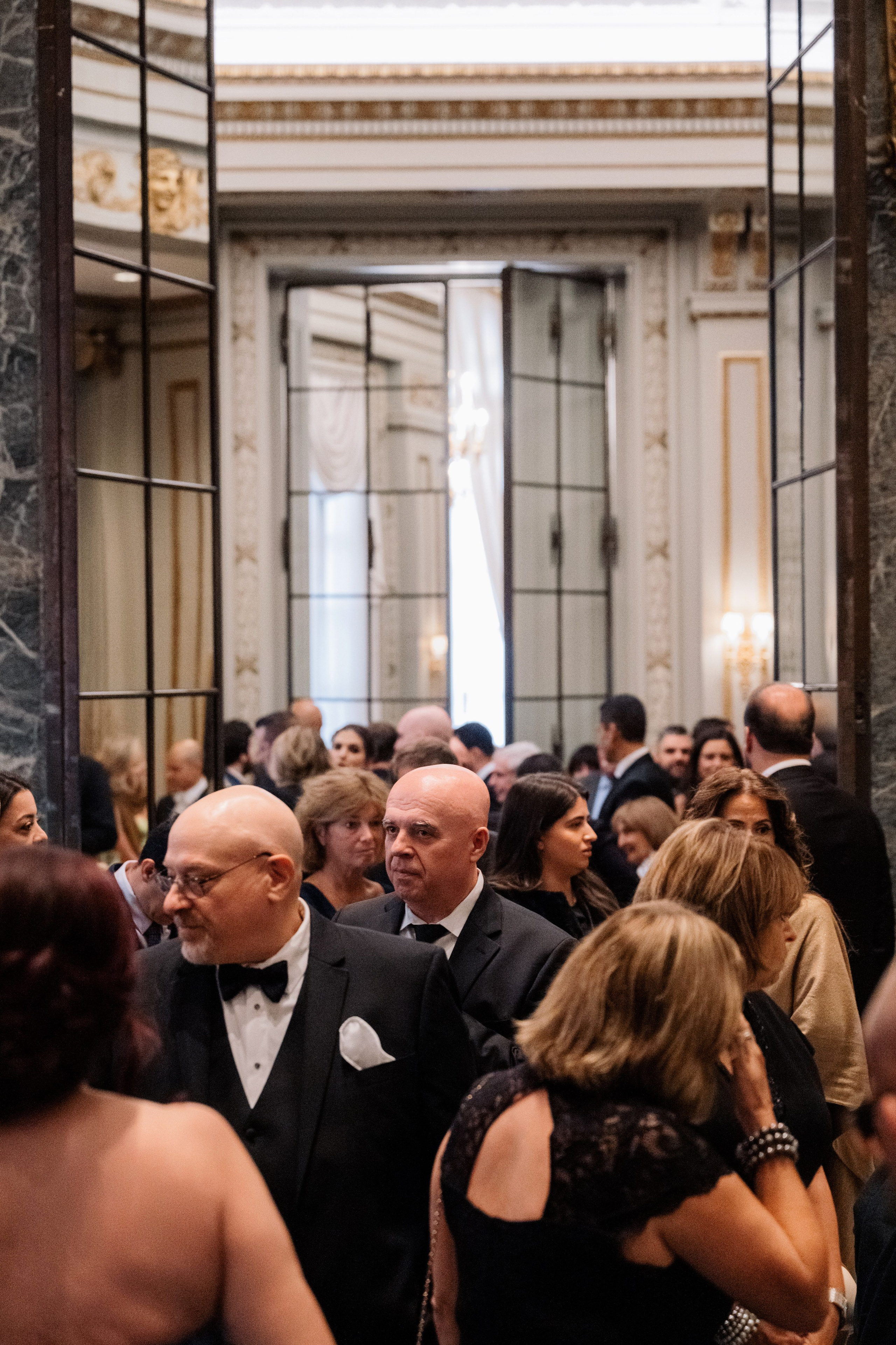 a group of people standing in a room