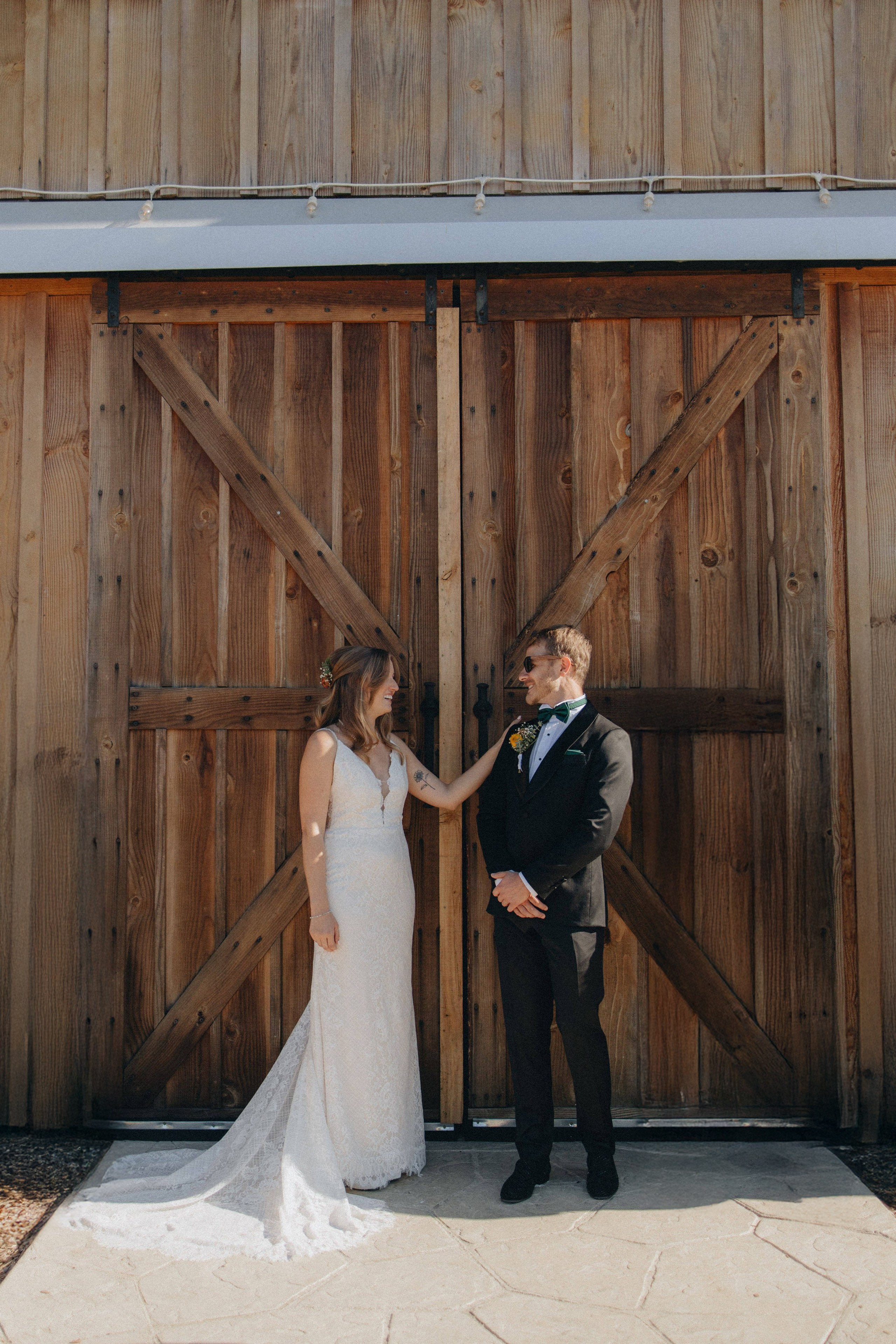 Jessie and Isaac on their wedding day in Portland, Oregon – a genuine moment of joy captured by photographer Georgy Shishkin in a romantic outdoor style, reflecting the charm of Portland & Seattle wedding photography.