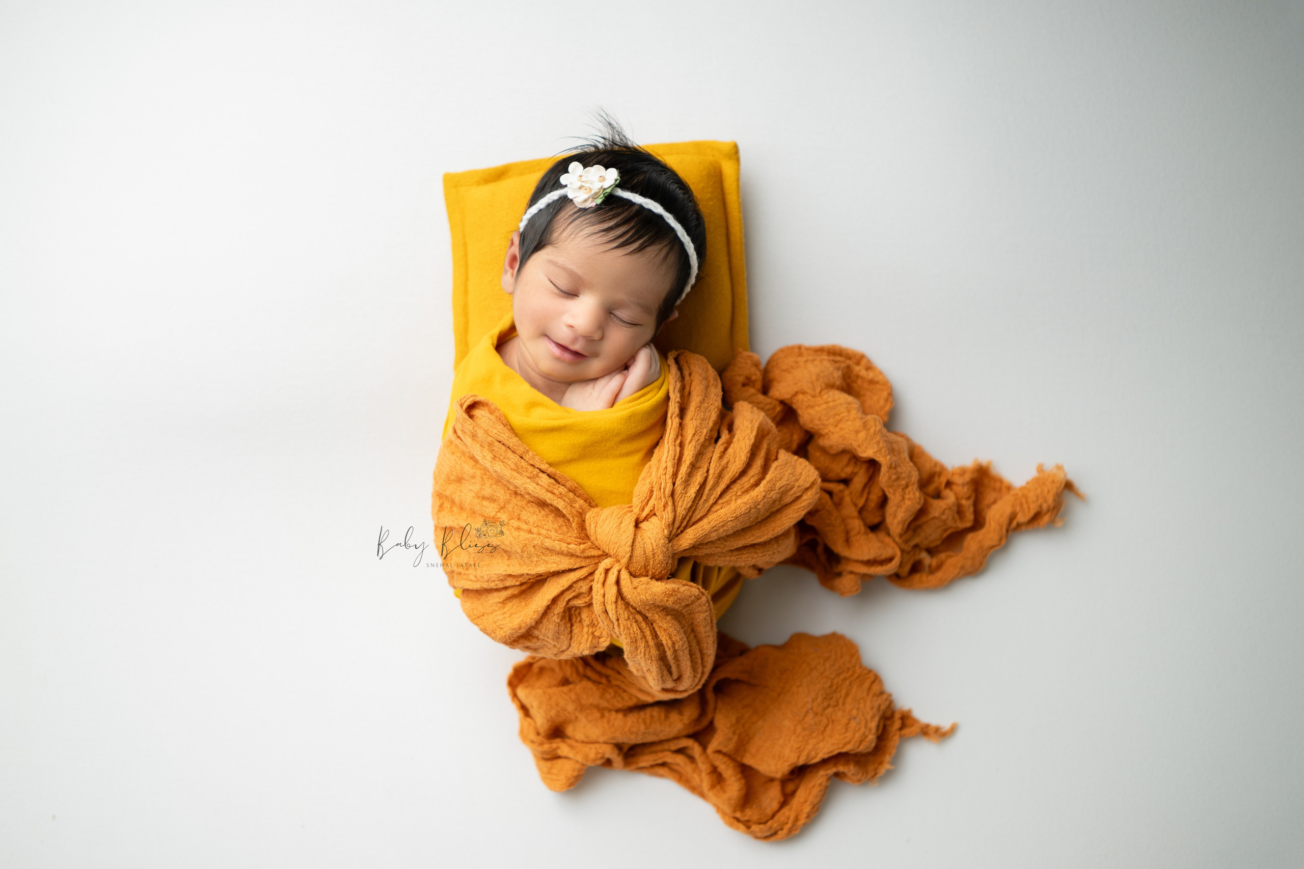 Newborn photo session in Doha Qatar, baby, sitter, cake smash, pre-birthday, maternity, family photographer in Doha, Qatar