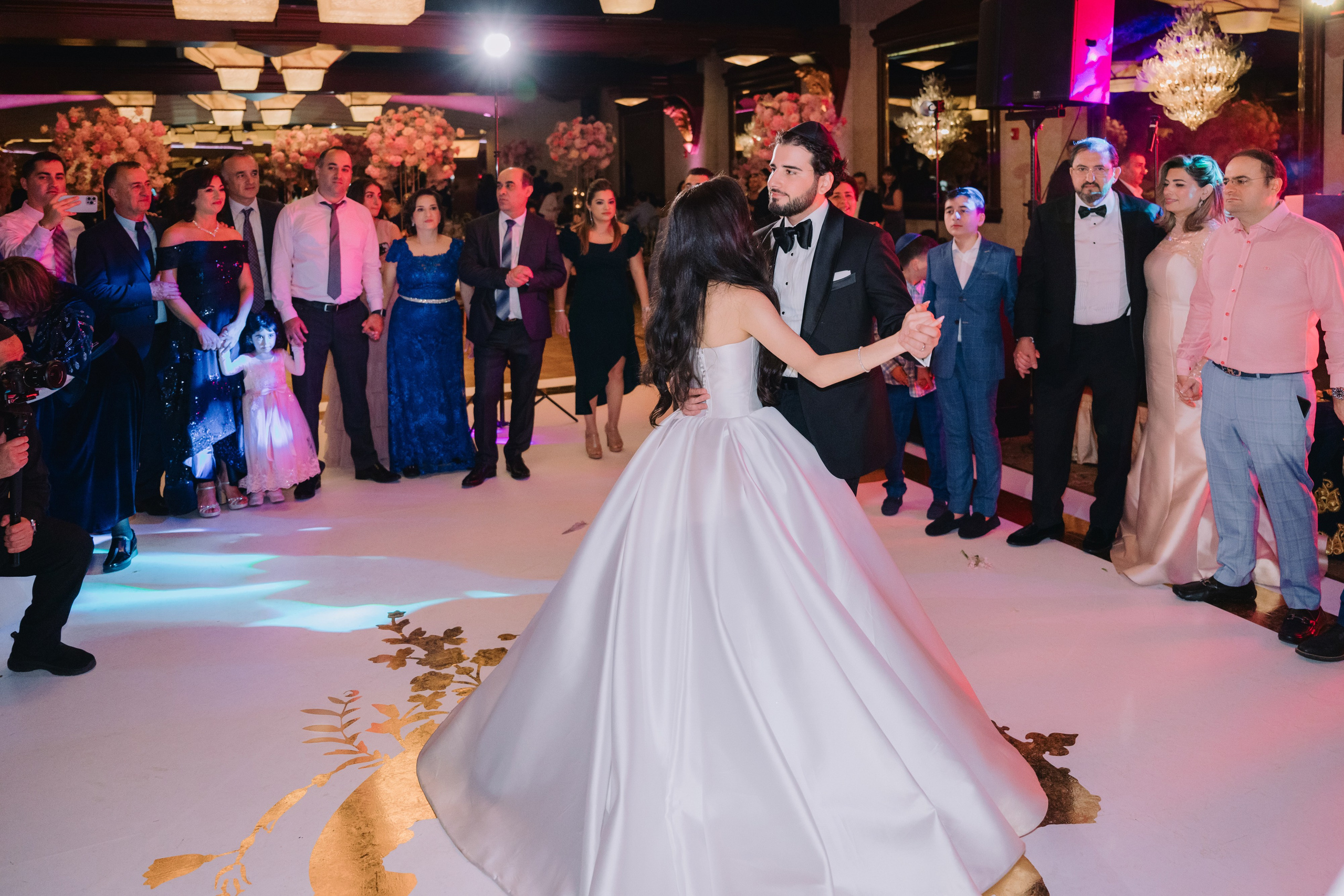 a bride and groom dancing at their wedding reception
