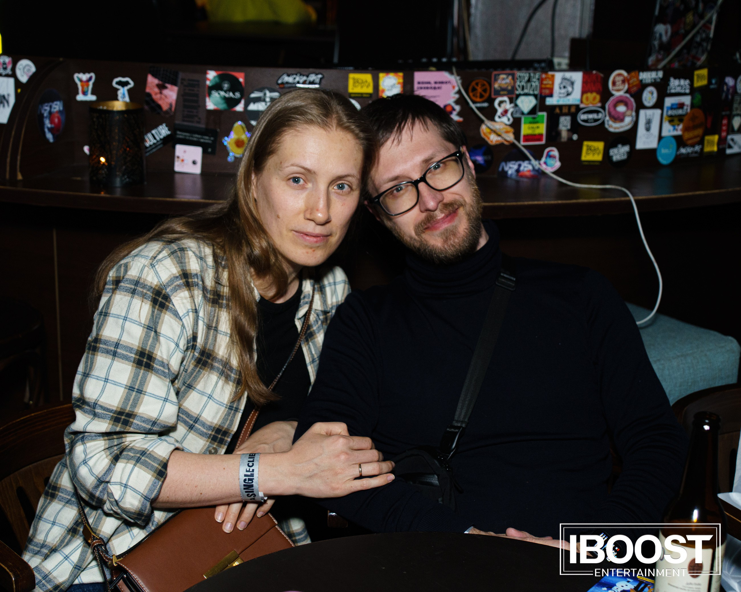 Woman and man sitting together and posing for a photo at the Animal JazZ concert.