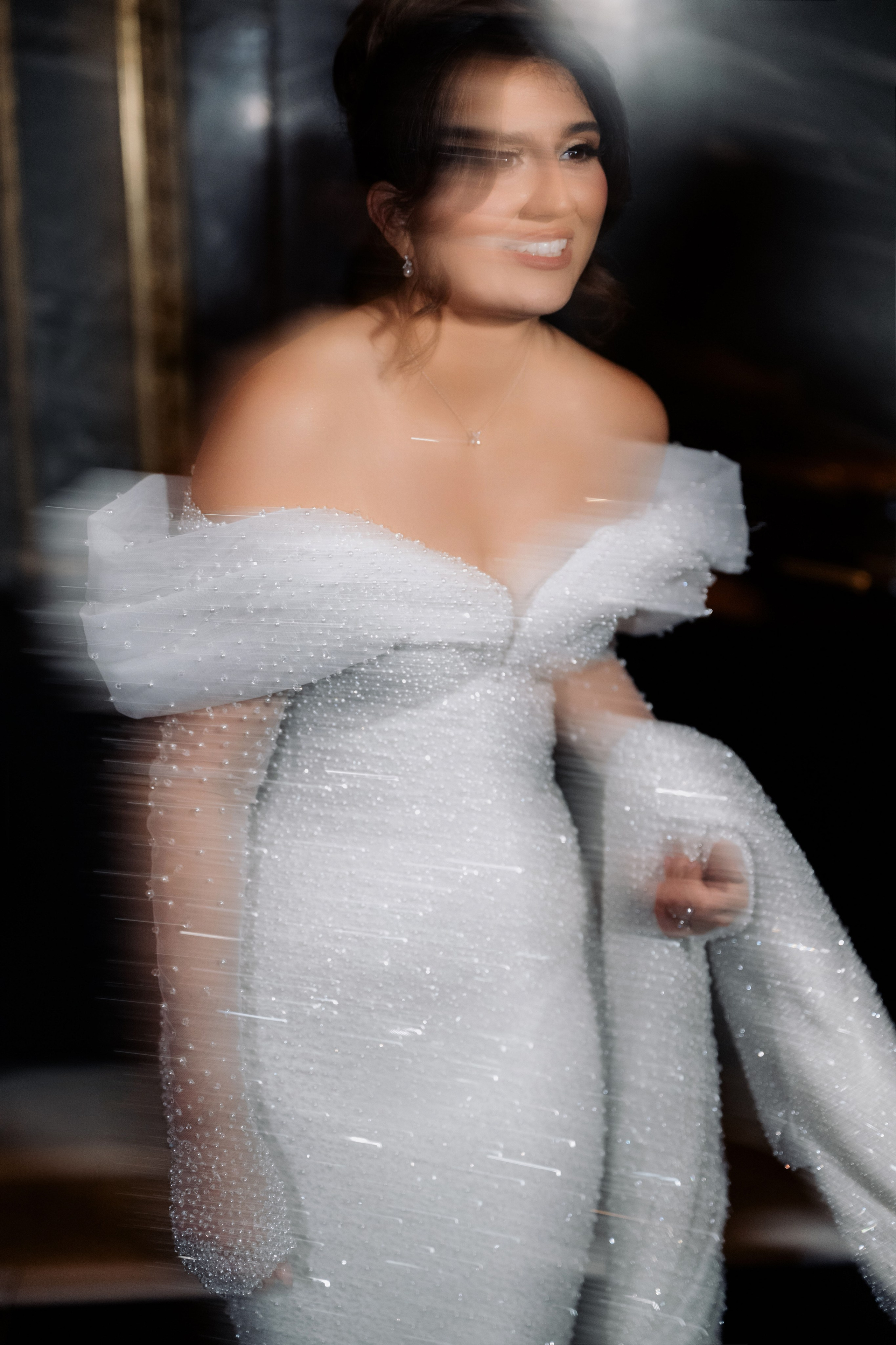 a woman in a white dress with a white dress