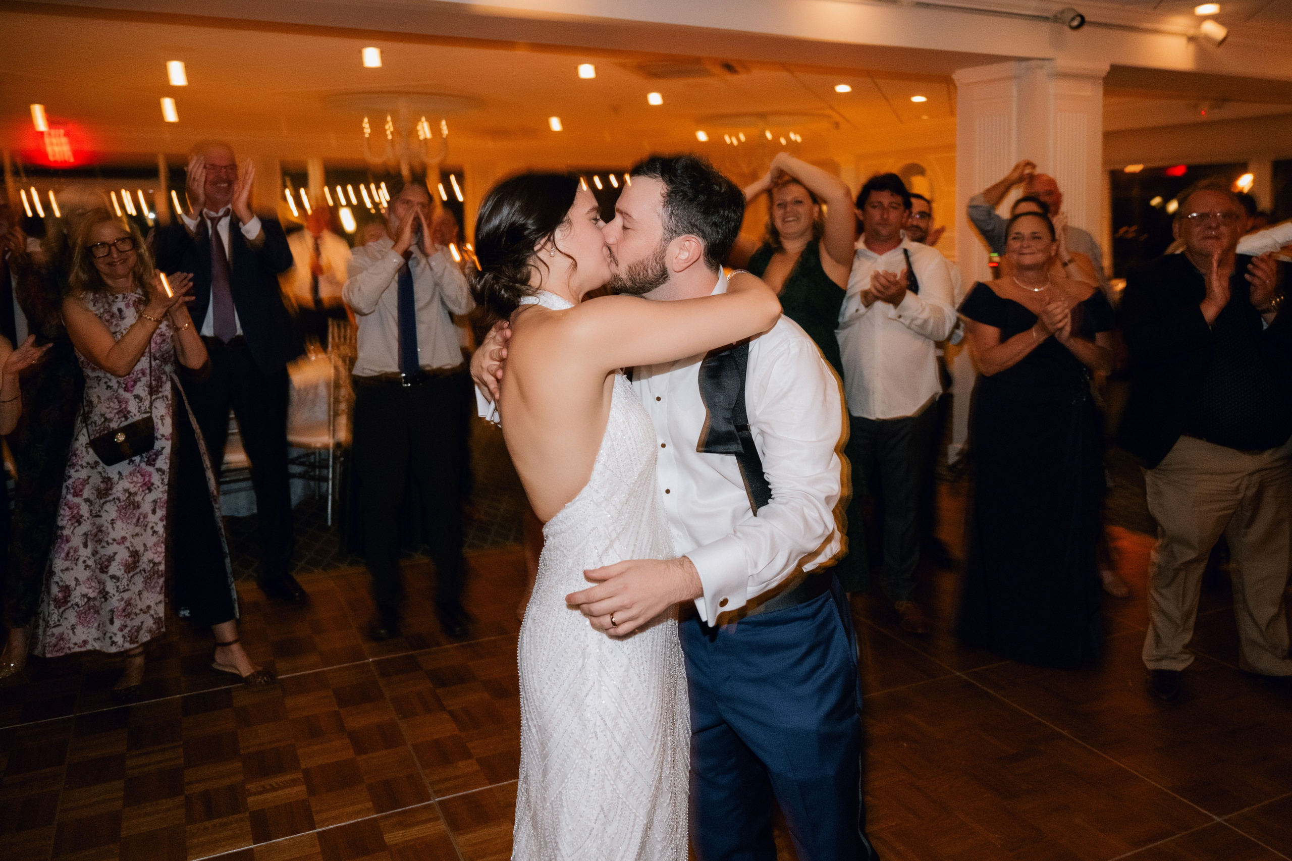 a couple dancing on a dance floor