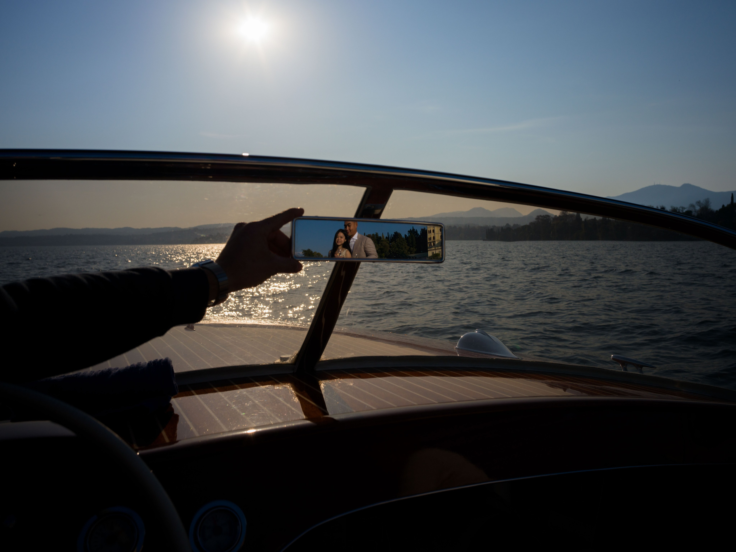 Romantic engagement on Lake Garda with Isola del Garda view.
