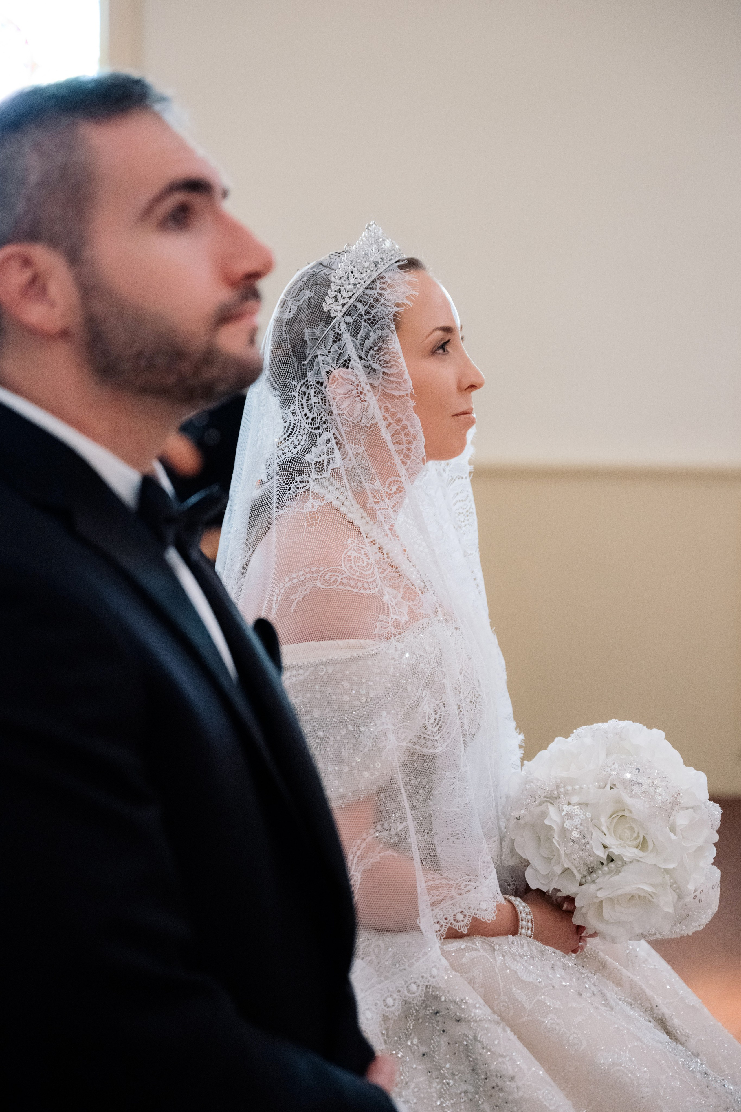 a man and woman sitting on a bench
