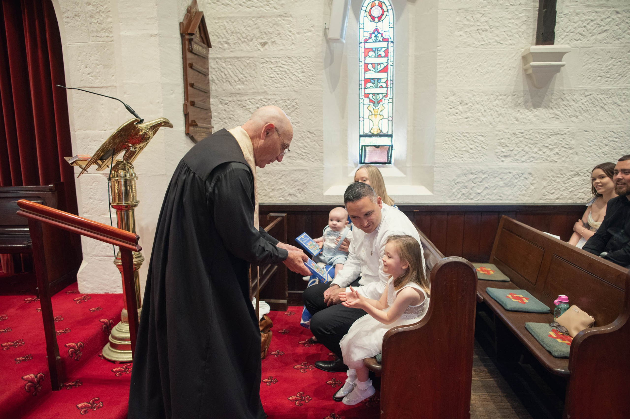 Christening Photography Sydney. Baptism photographer at St. Peter’s Anglican Church in Watsons Bay