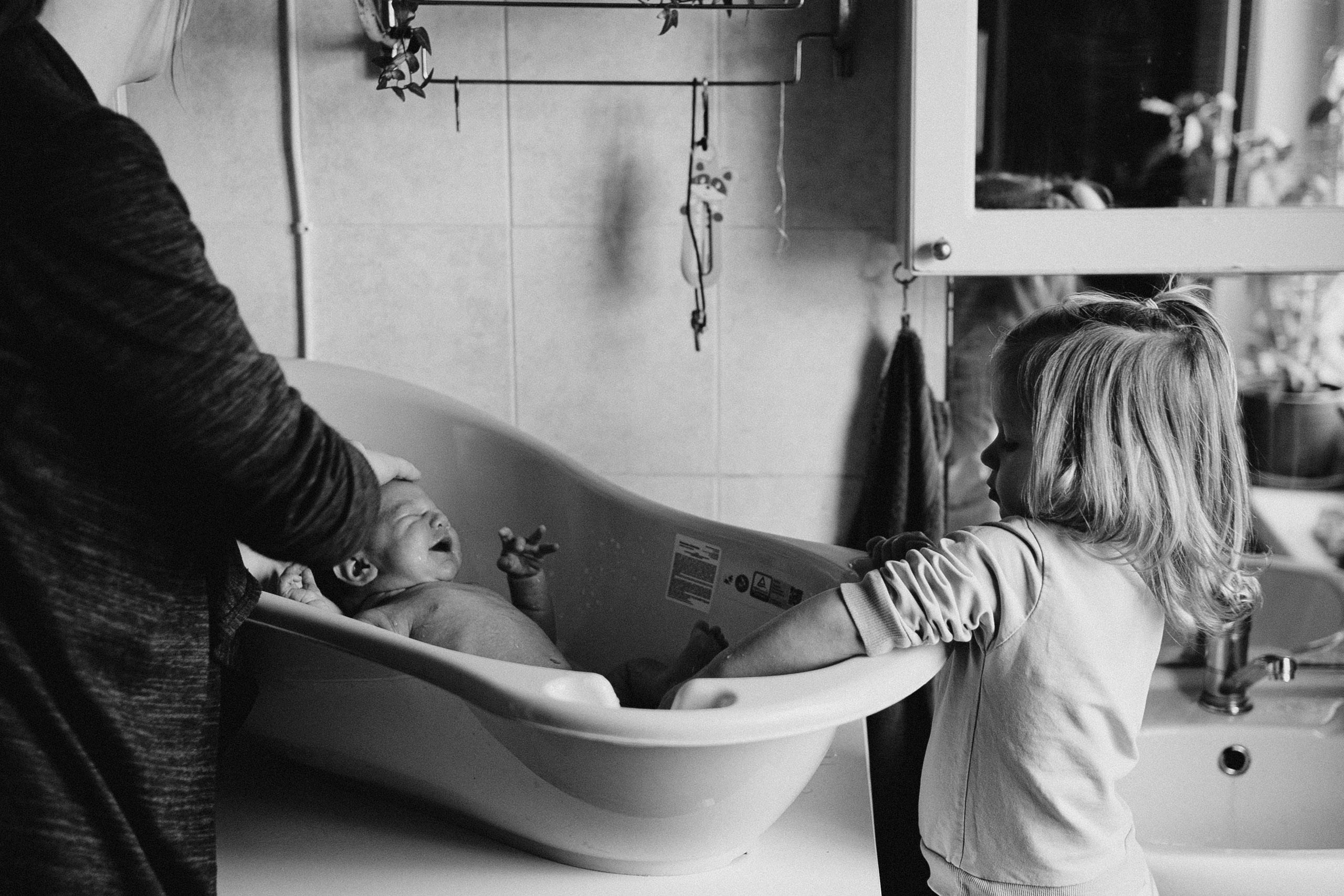 Jaundzimušā bērna fotosesija mājās