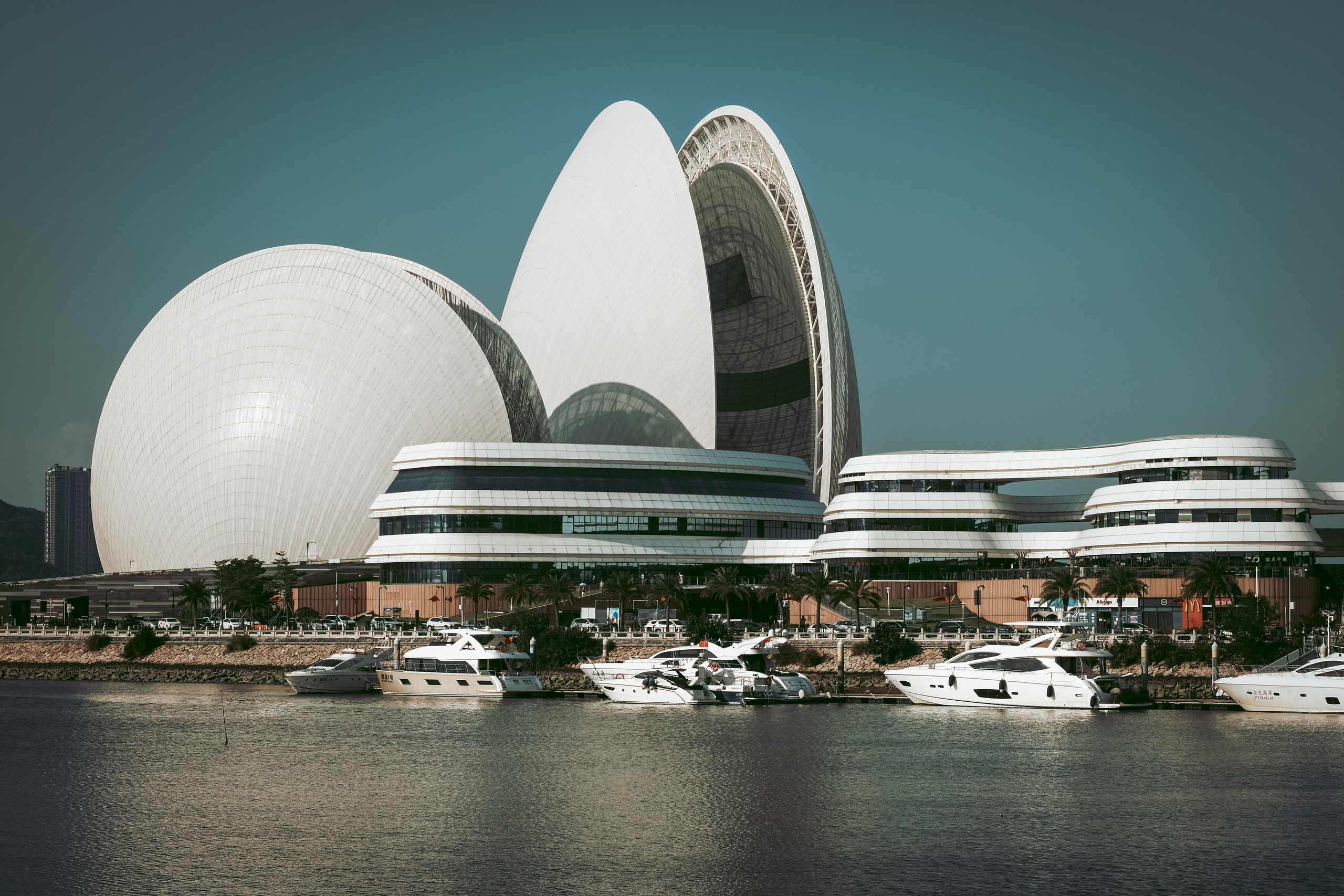 Zhuhai Opera House Guangdong | Zhuhai Opera House Building | Zhuhai Opera House is located on the shores of the island in Zhuhai, Guangdong province, China, where the surging Pearl River meets the South China Sea and becomes calm.
