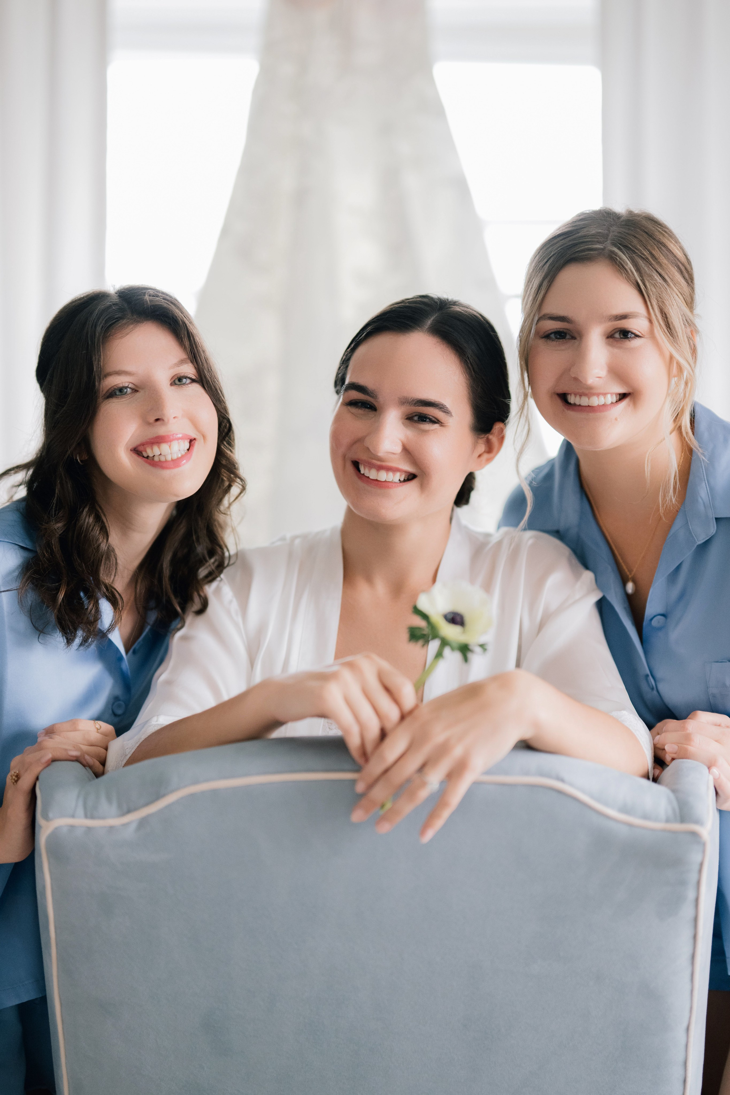 three women in blue shirts