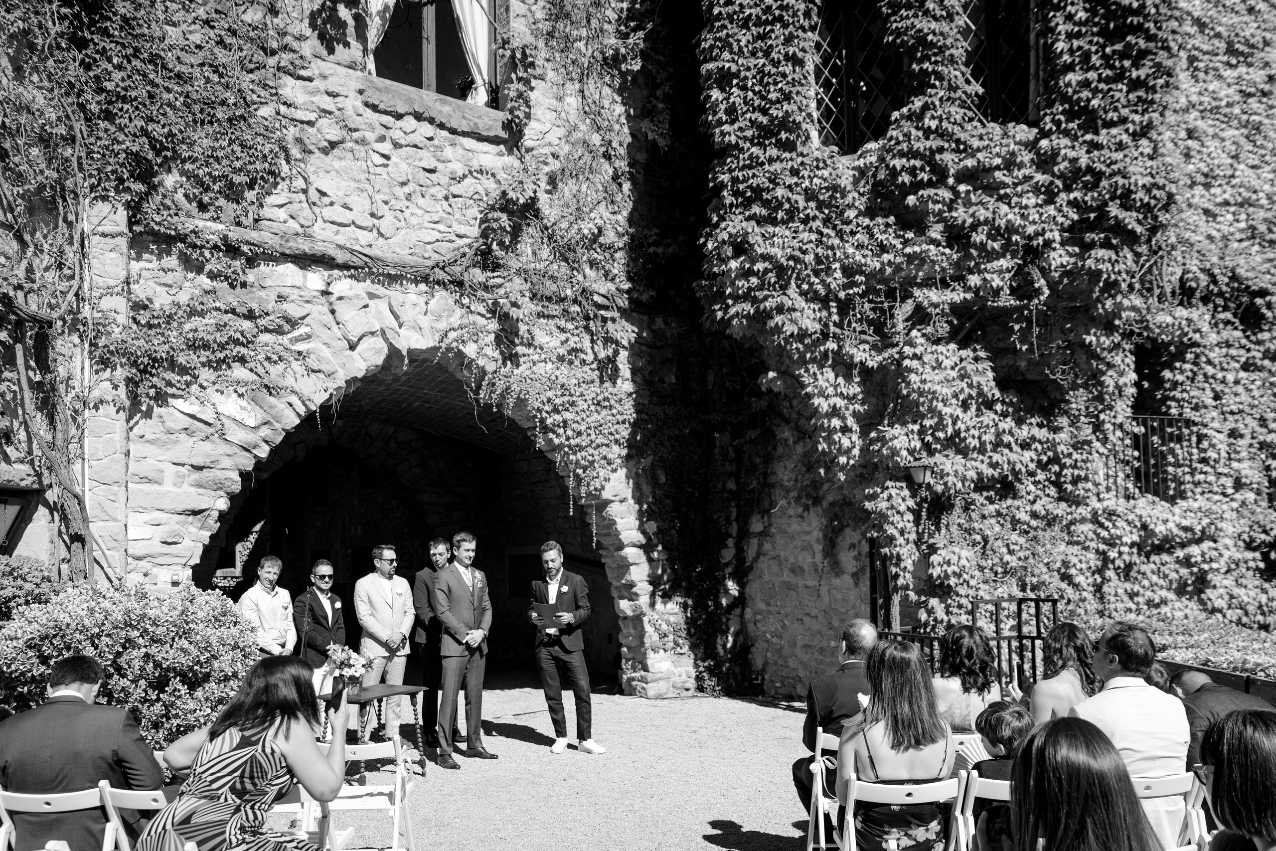 The groom is waiting for the bride to start the wedding ceremony.