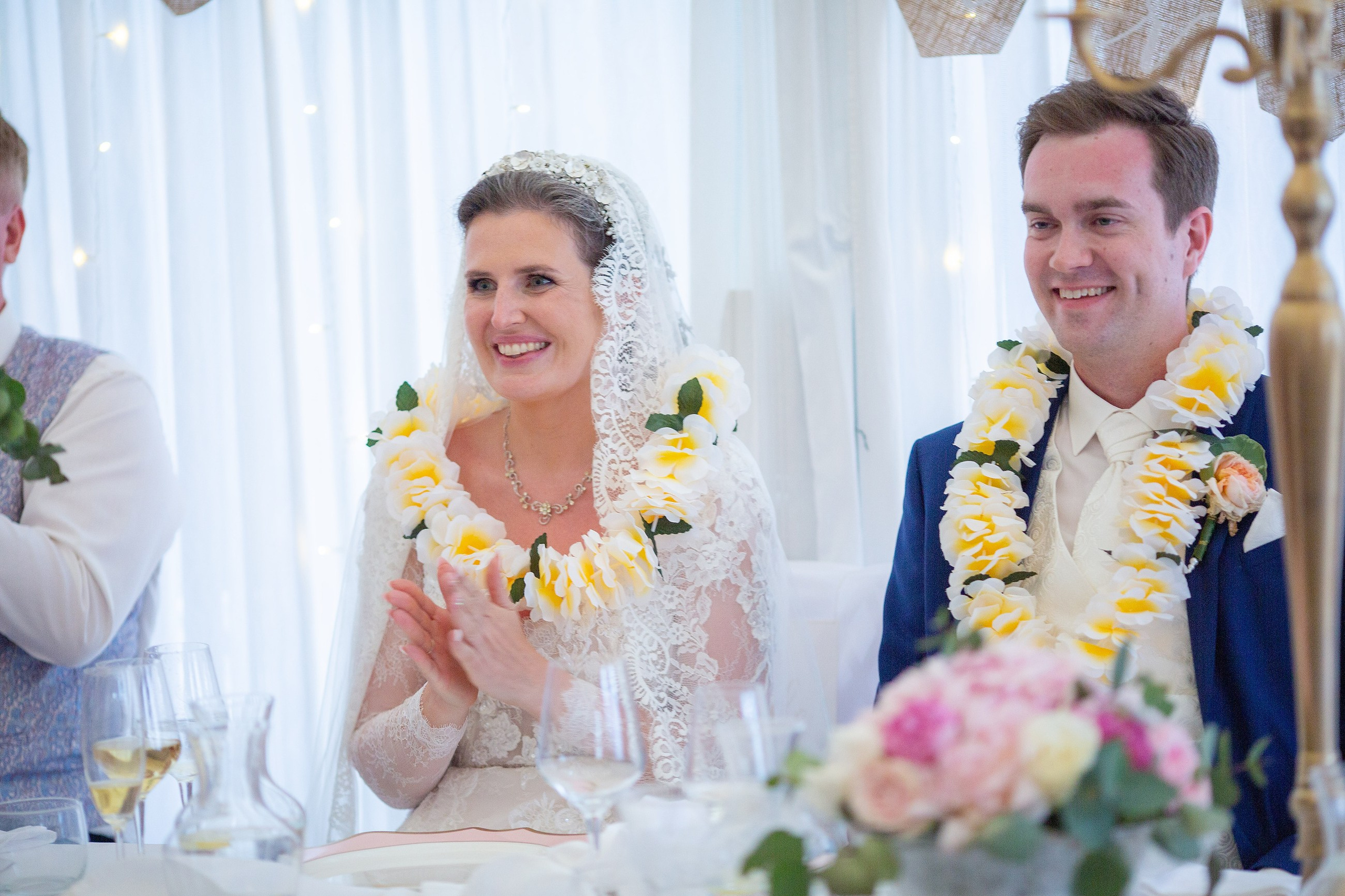 Bride & Groom Wearing Hawaiian Lias