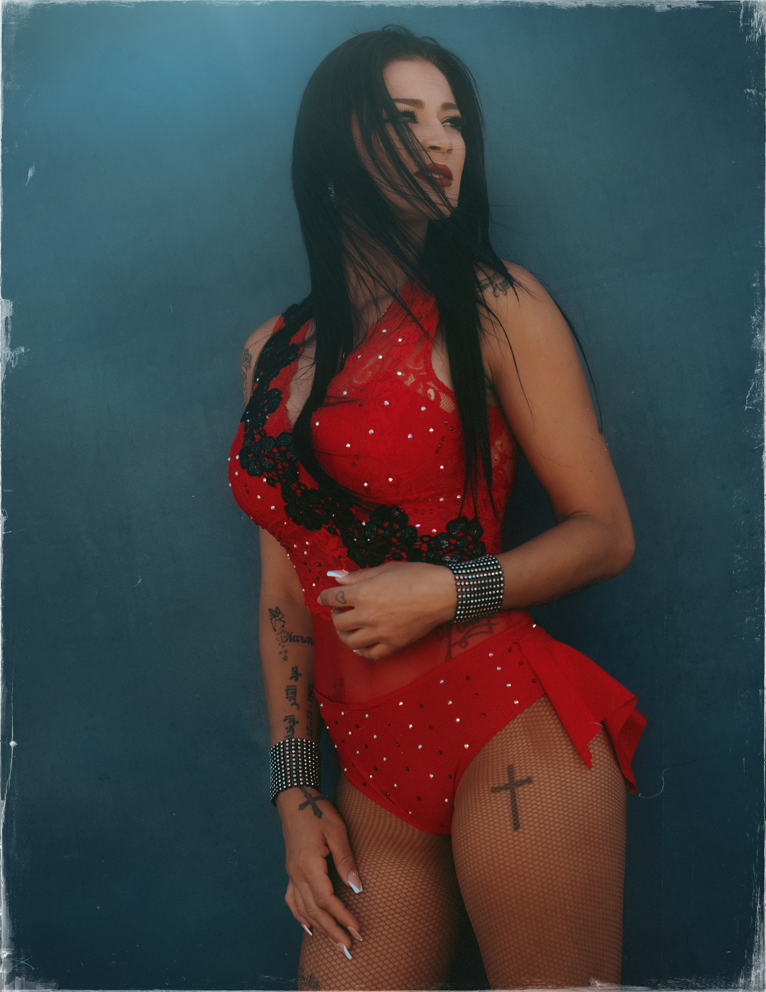 Glamorous photoshoot for a circus performer: motorcycle, fashion and dynamics