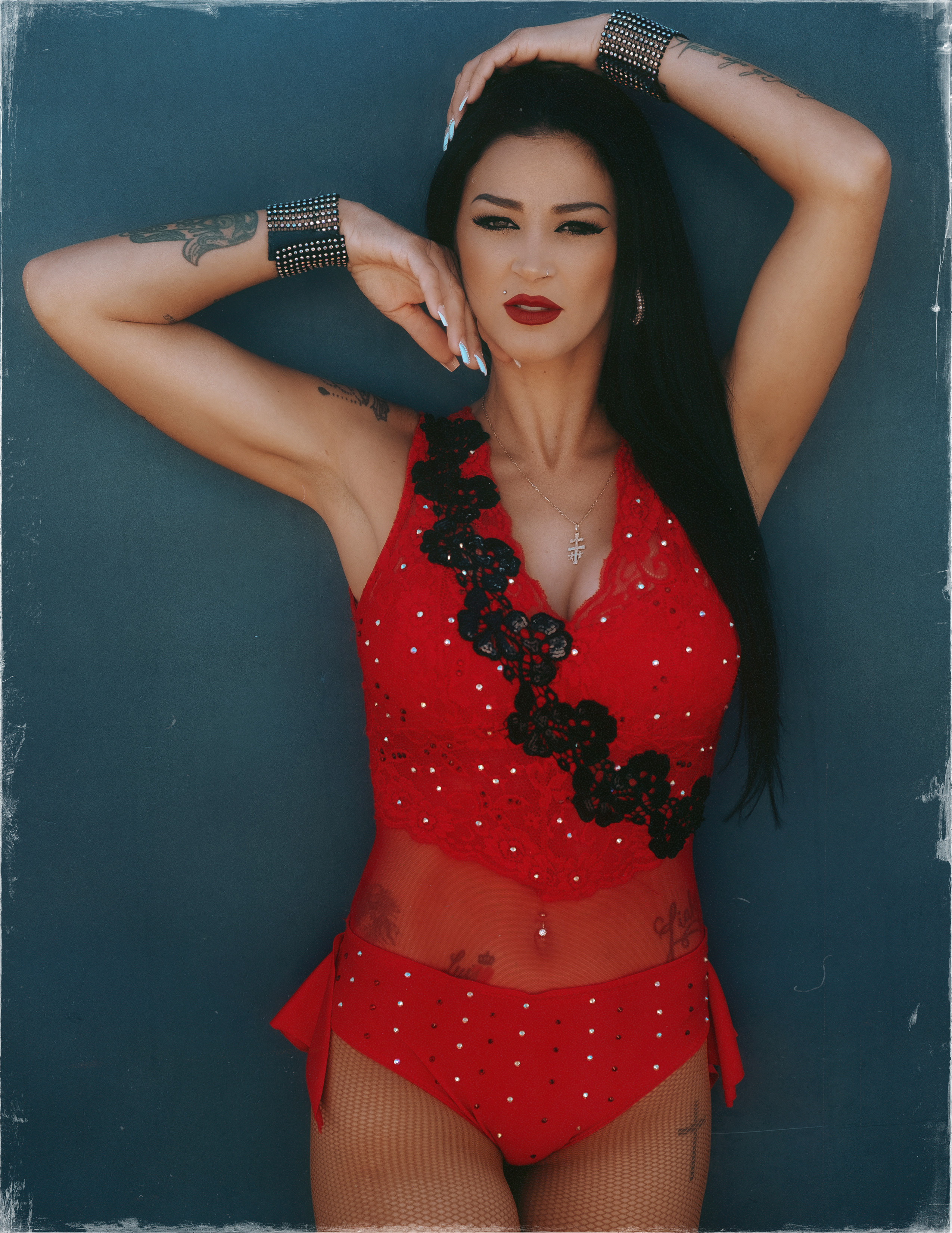 Glamorous photoshoot for a circus performer: motorcycle, fashion and dynamics