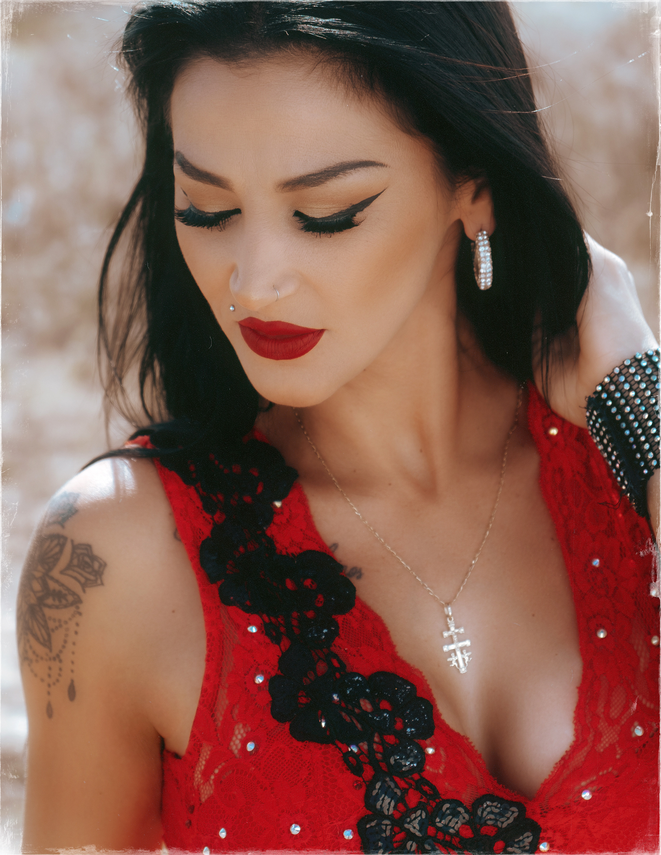 Glamorous photoshoot for a circus performer: motorcycle, fashion and dynamics
