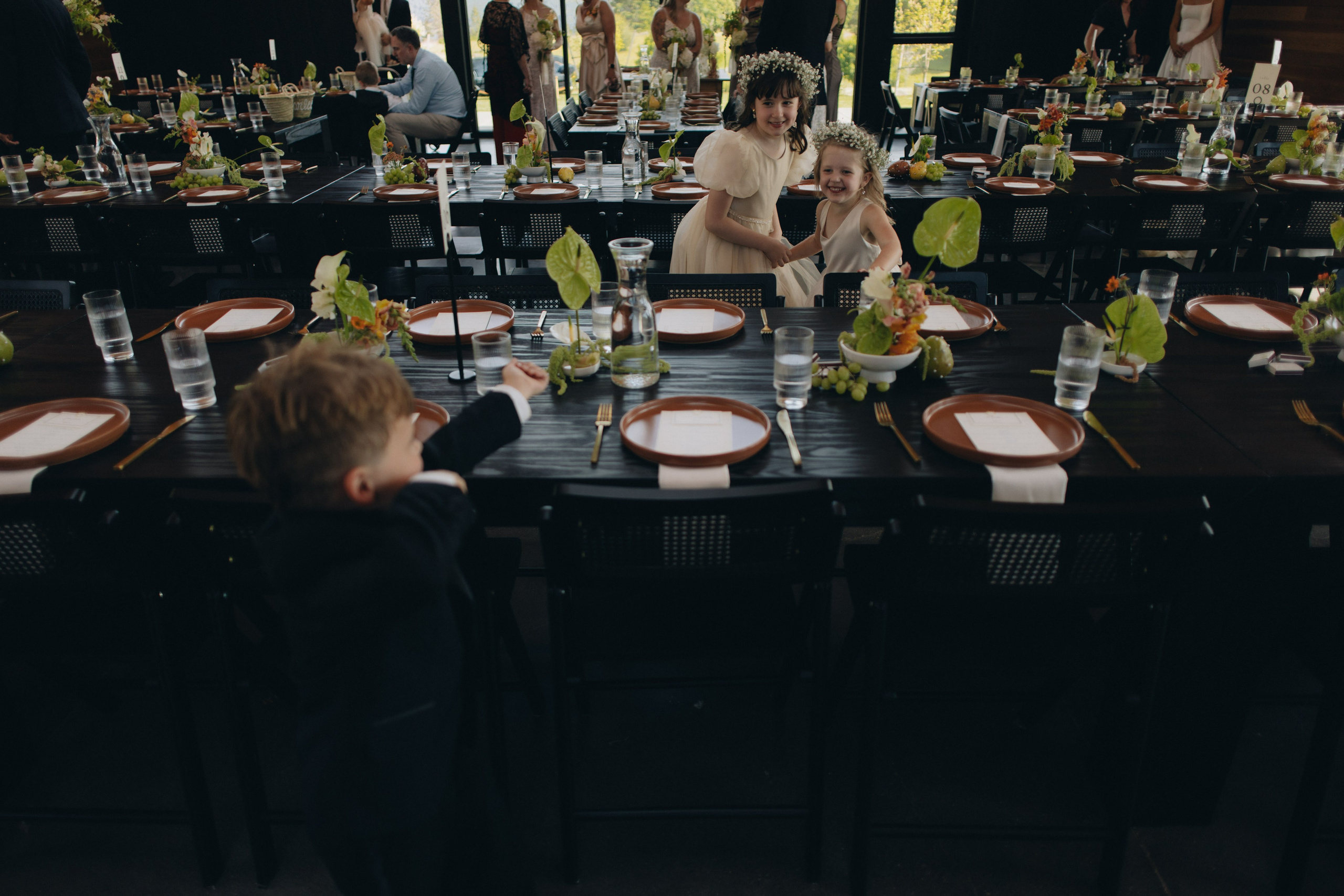 Candid guest moments during a Wind Mountain Ranch wedding