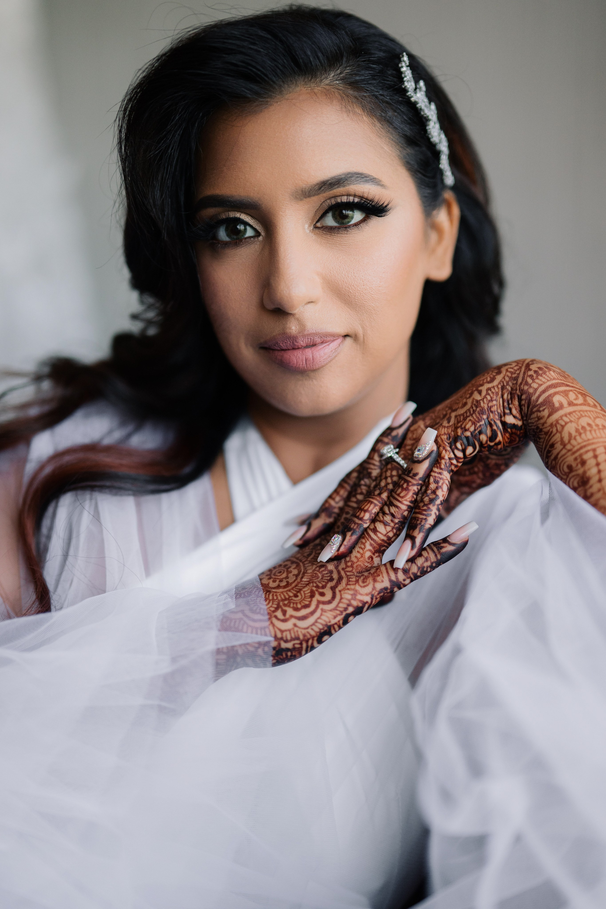 a woman with a hen on her arm