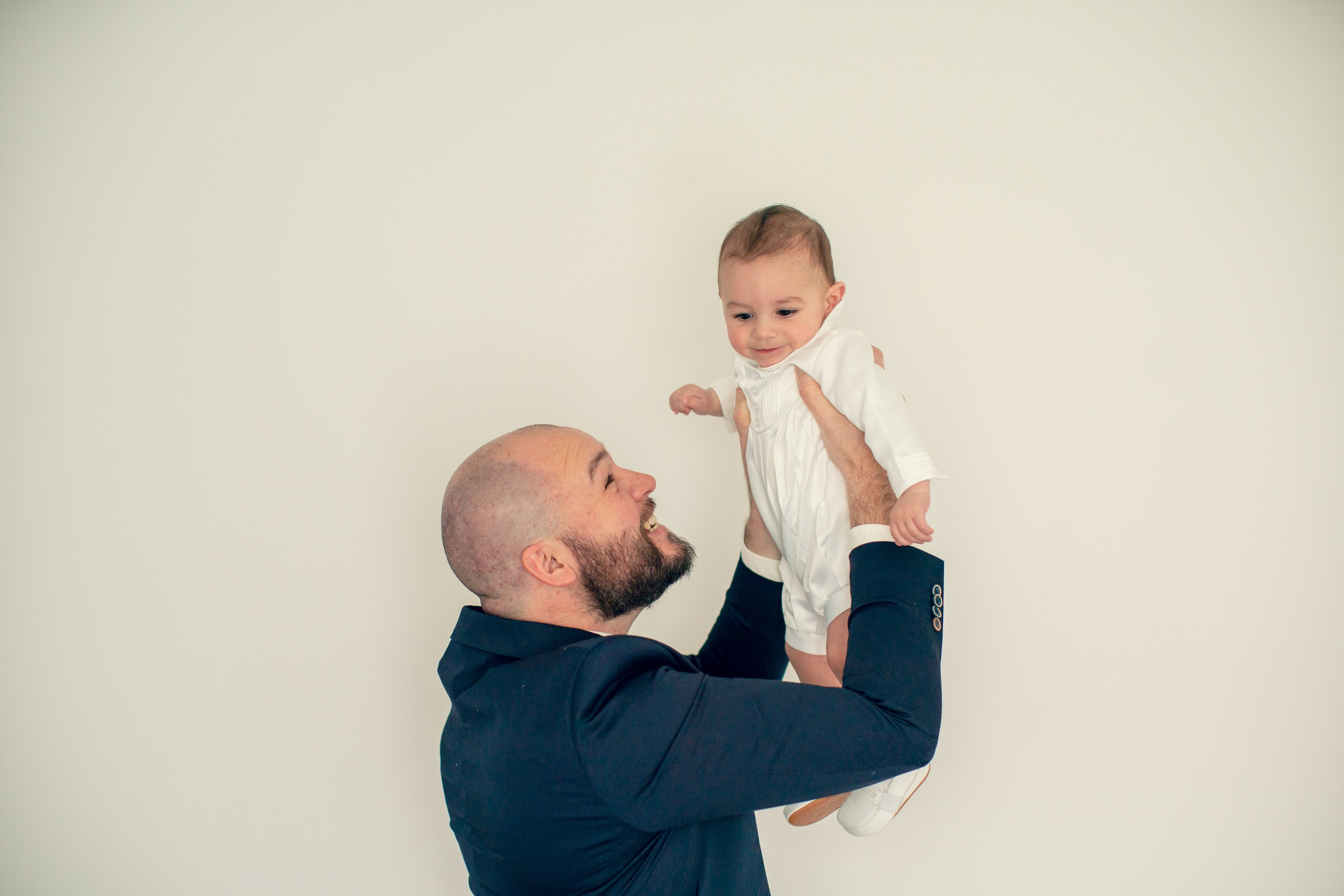 christening photography Sydney, baptism photographer Sydney, baby christening photos, family photographer Sydney, natural light christening photos, church christening photography, reception photography, candid family moments, christening day storytelling, full christening photoshoot experience