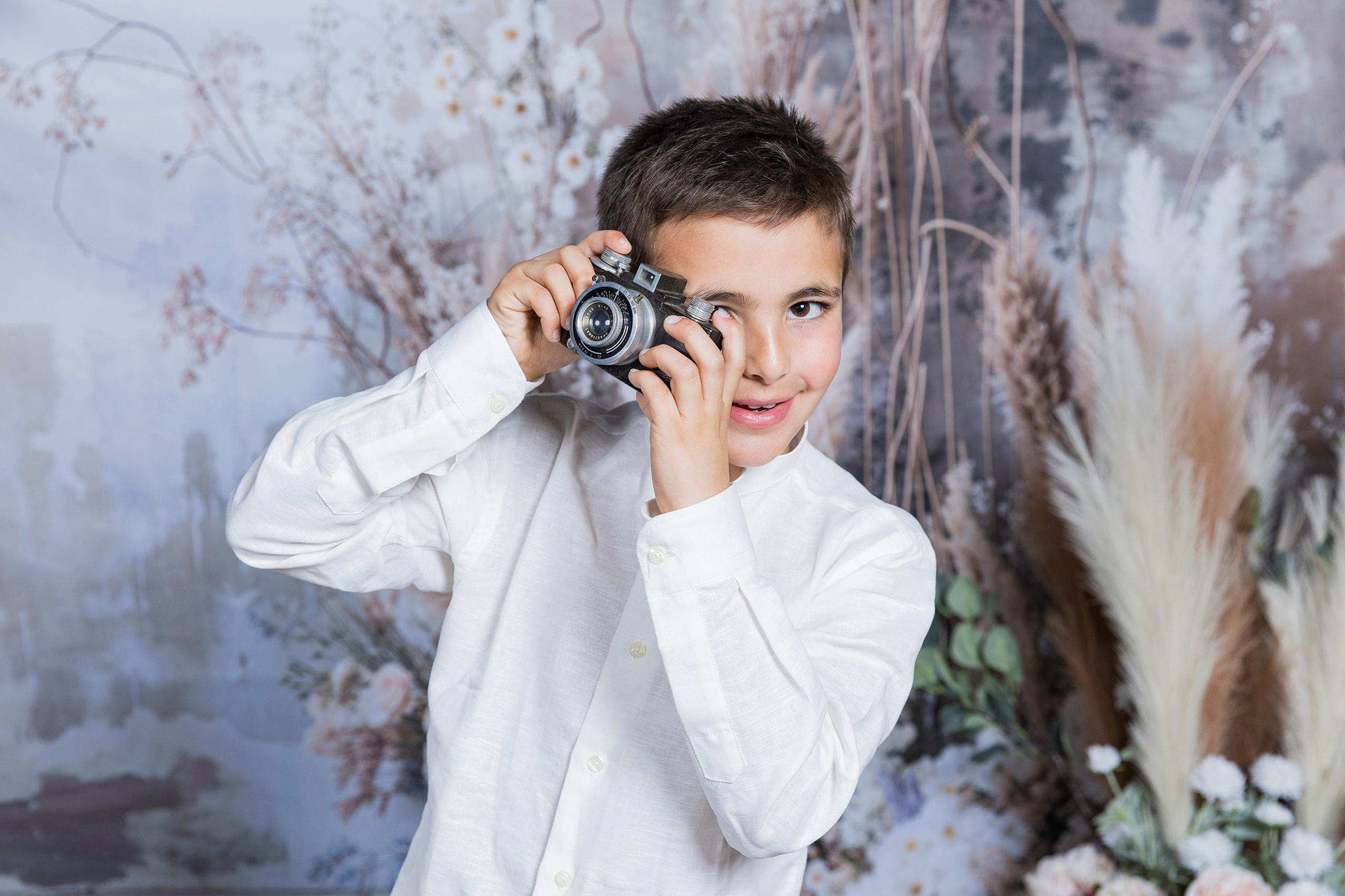 Fotografía de Comuniones en Torrejón de Ardoz, Madrid - Rainbox. Rainbox Estudio de Fotografía