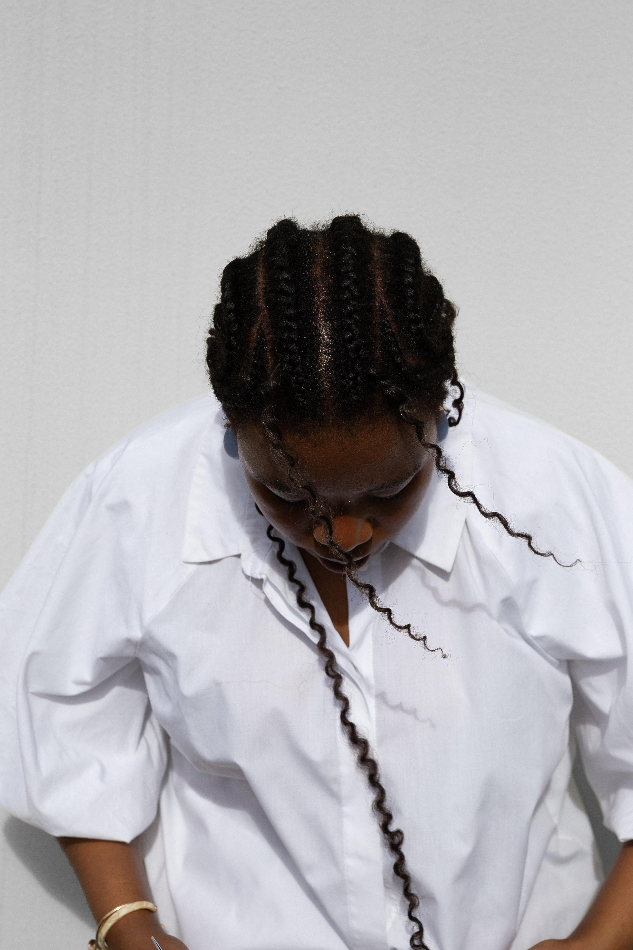 The girl next to the wall