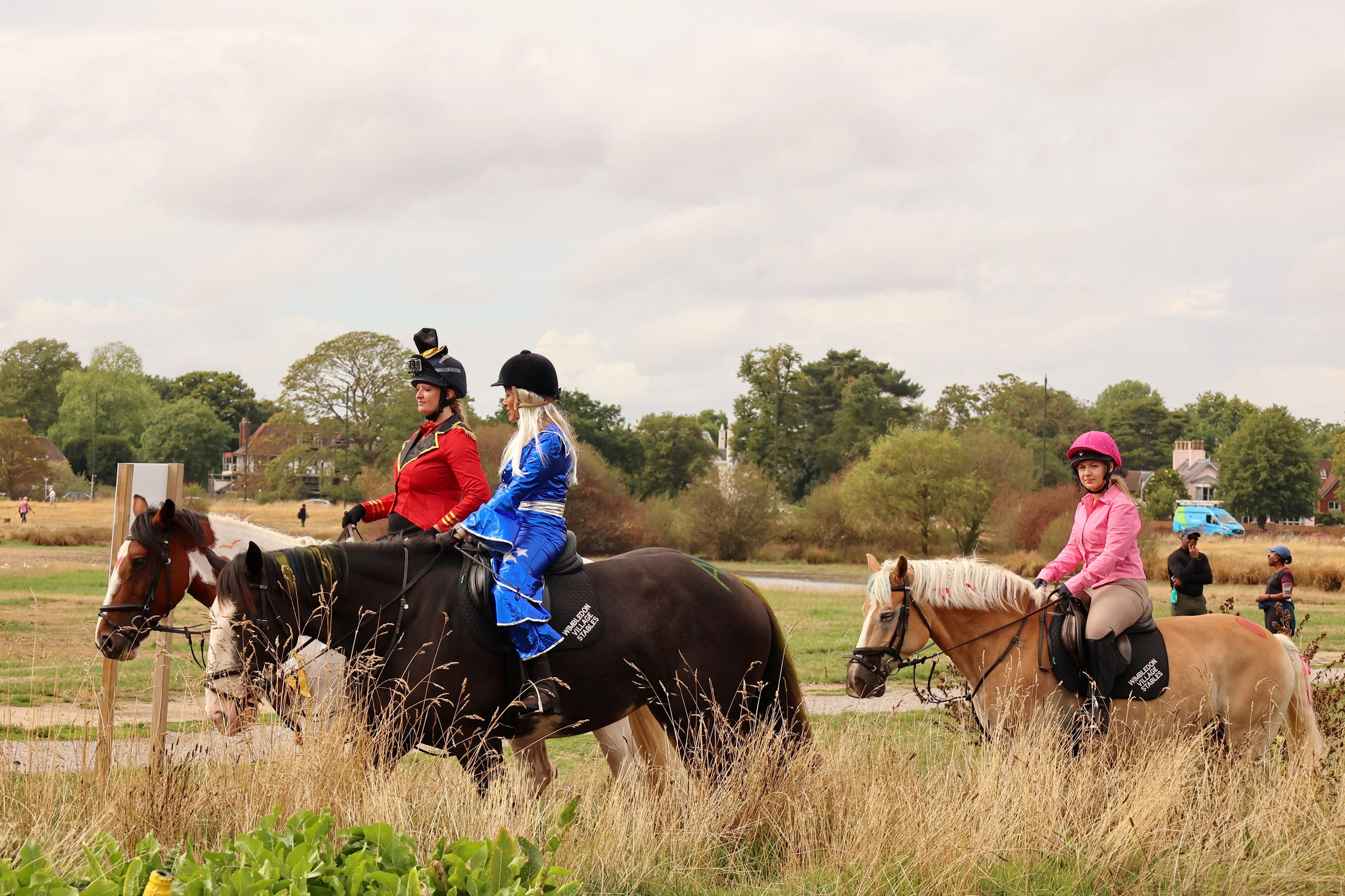 Charity ride Wimbledon Stables. Couples and portraits photographer Wimbledon London