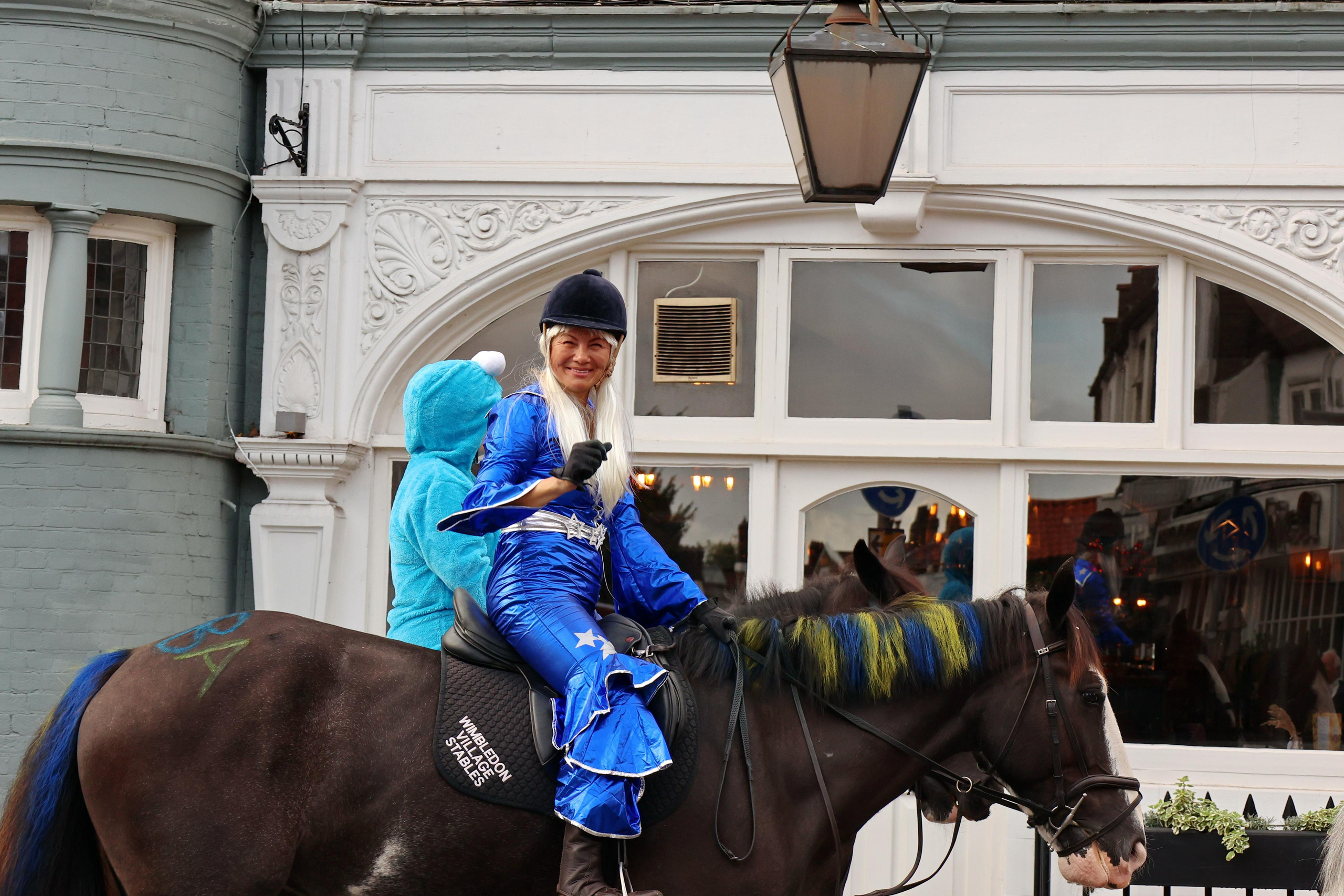 Charity ride Wimbledon Stables. Couples and portraits photographer Wimbledon London