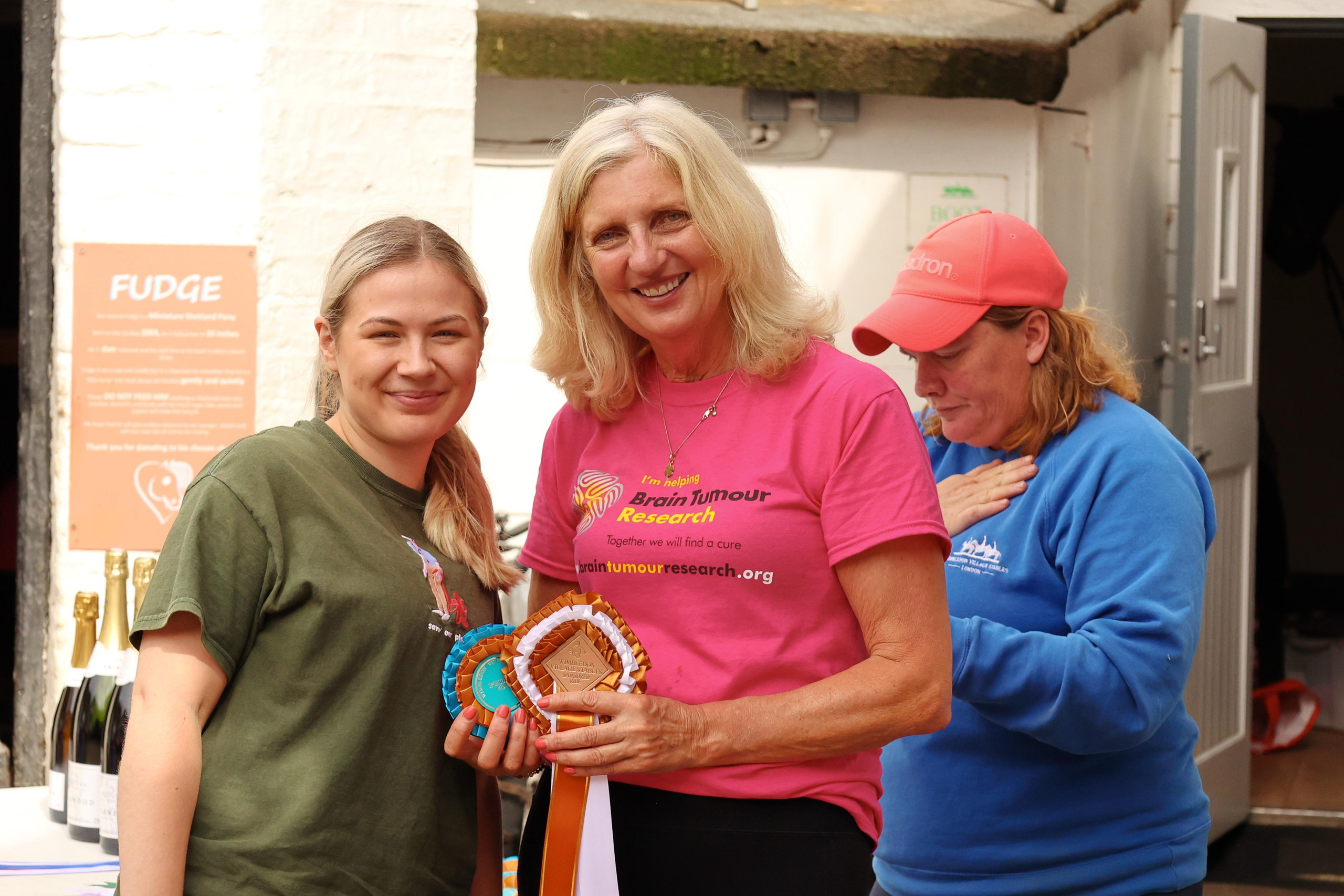 Charity ride Wimbledon Stables. Couples and portraits photographer Wimbledon London