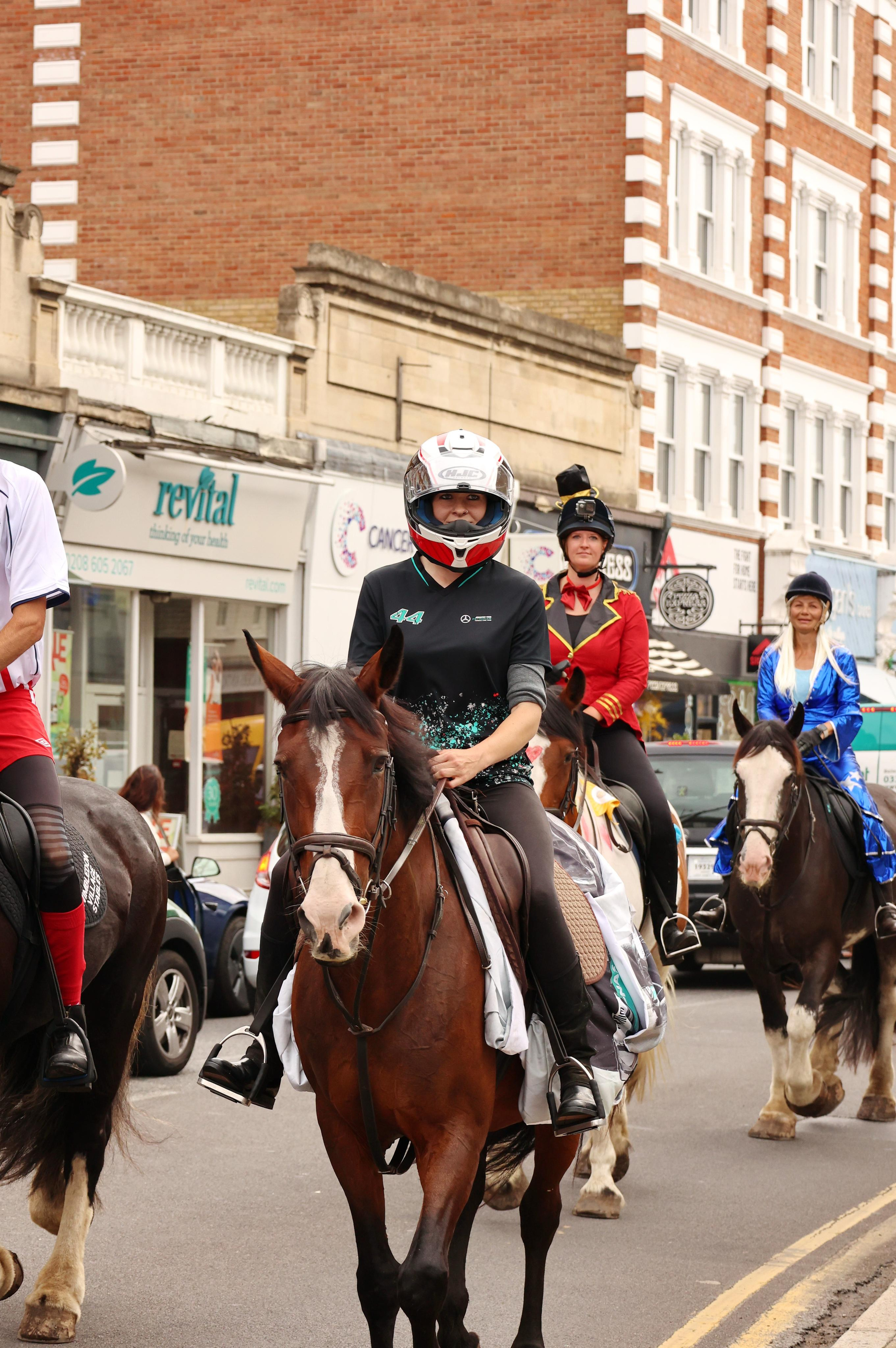 Charity ride Wimbledon Stables. Couples and portraits photographer Wimbledon London