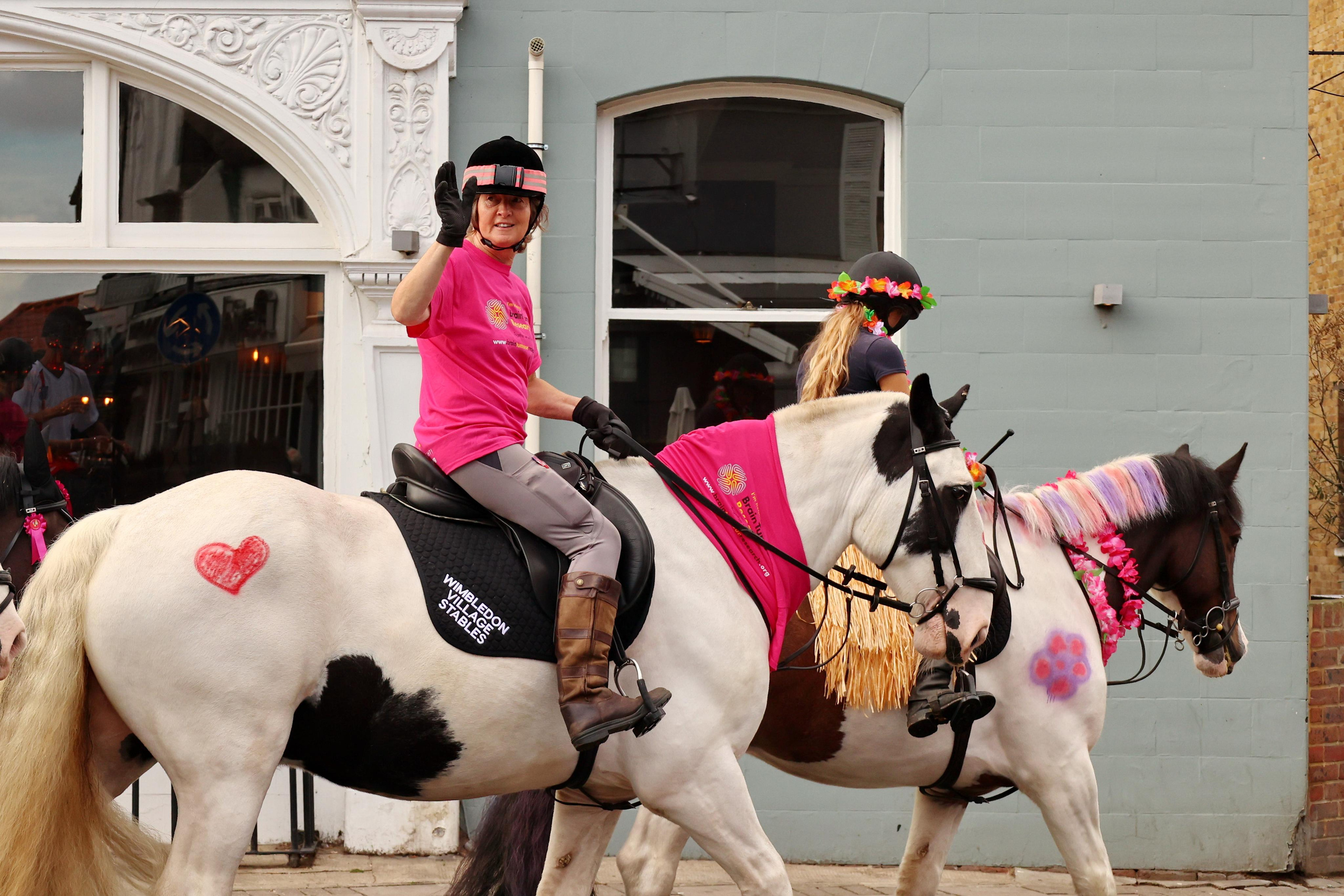 Charity ride Wimbledon Stables. Couples and portraits photographer Wimbledon London