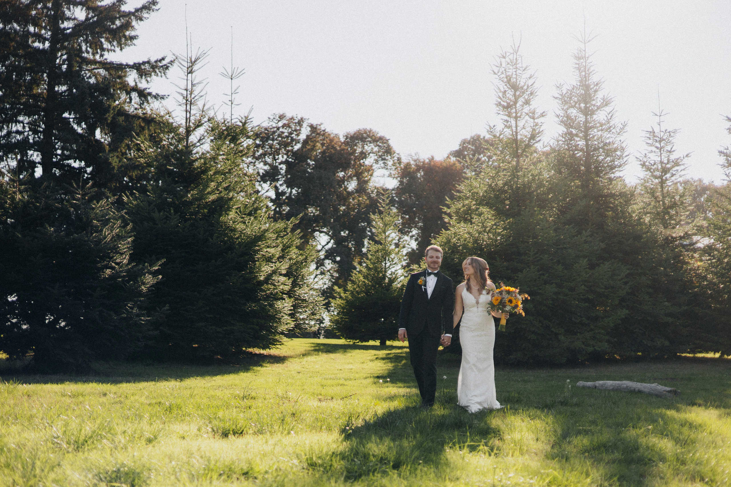 Jessie and Isaac on their wedding day in Portland, Oregon – a genuine moment of joy captured by photographer Georgy Shishkin in a romantic outdoor style, reflecting the charm of Portland & Seattle wedding photography.