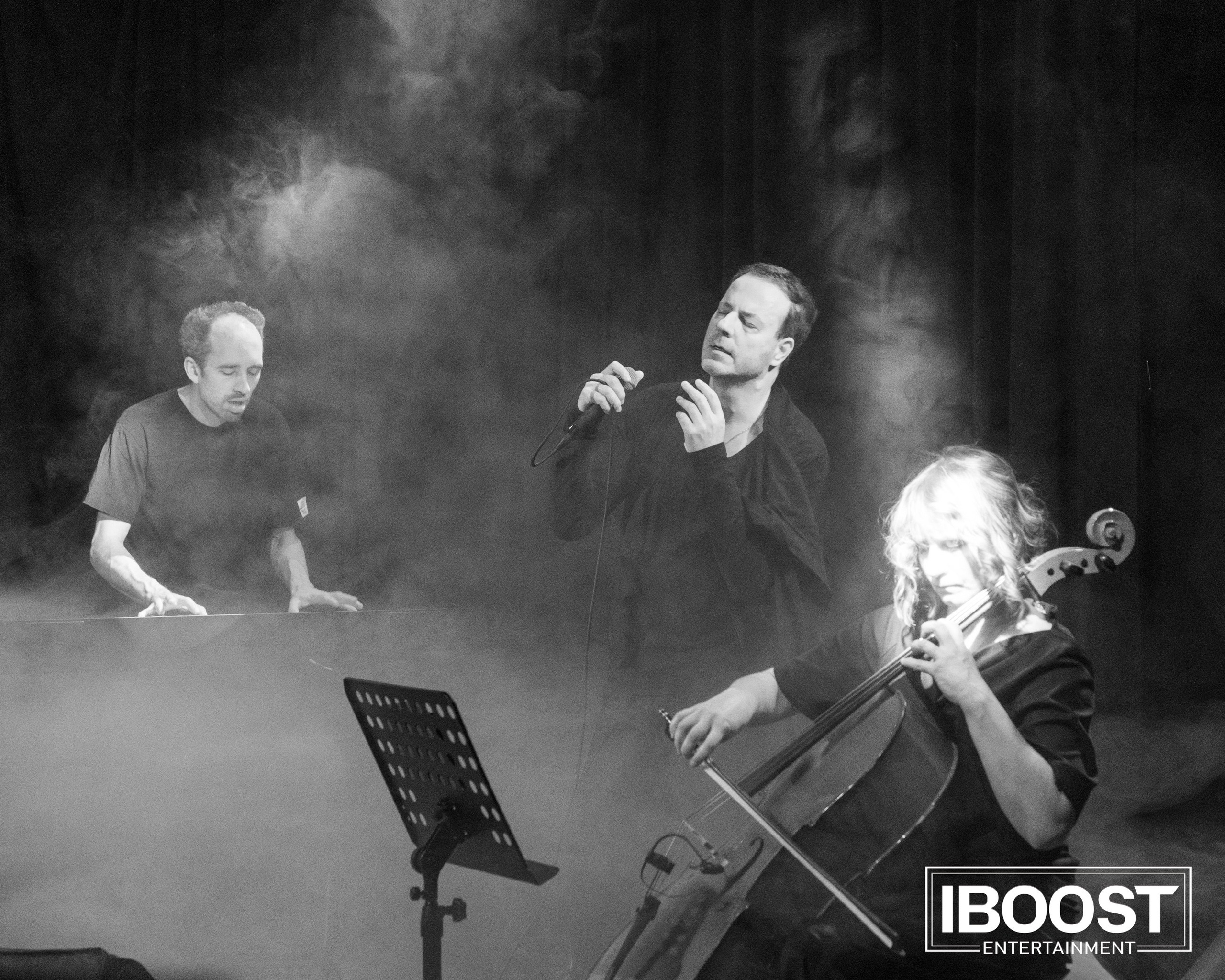 Black-and-white stage photo of Animal JazZ performing live in Sofia with Krasovitsky and the cellist.