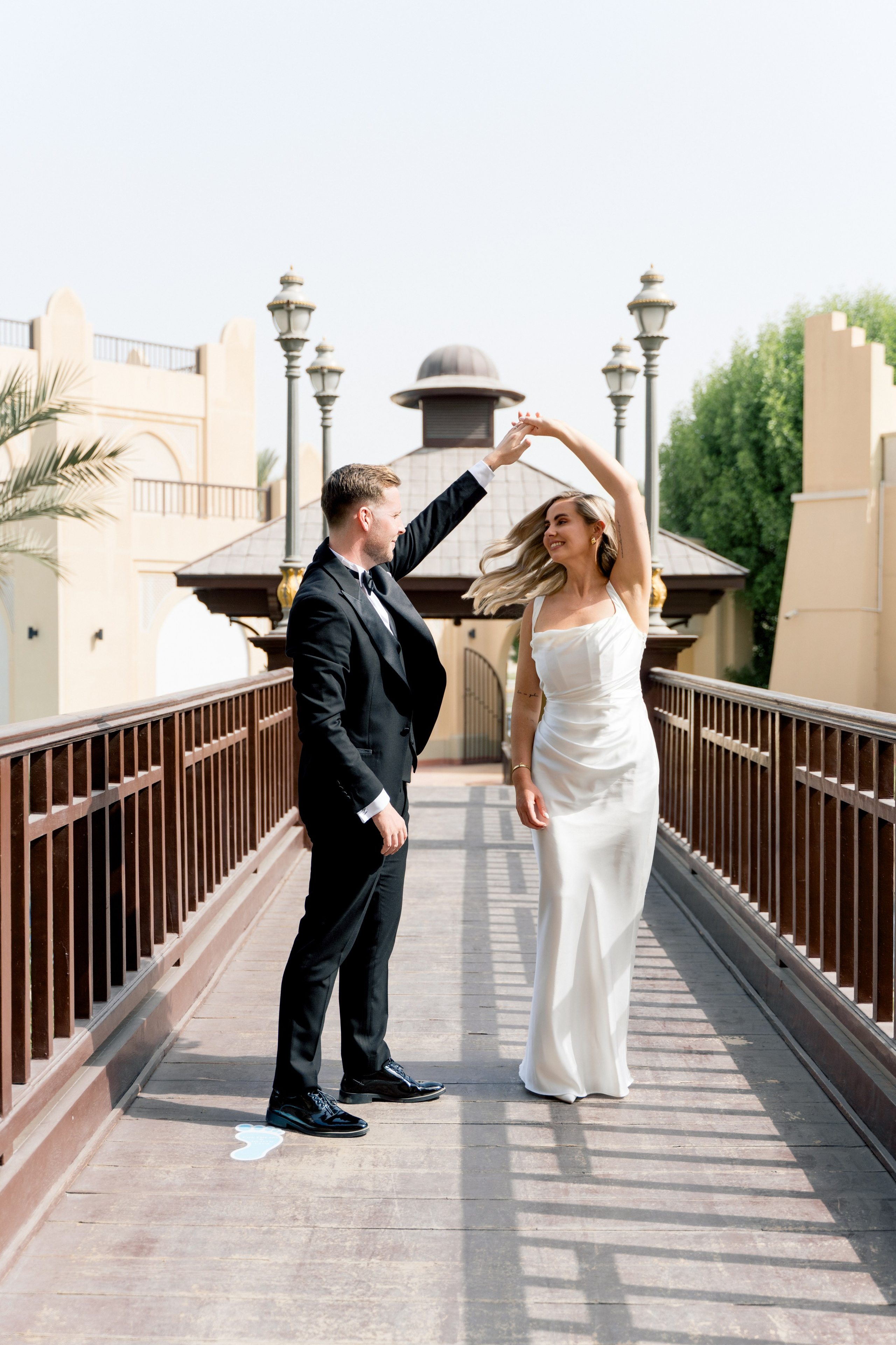 Wedding photographer capturing bride and groom emotions