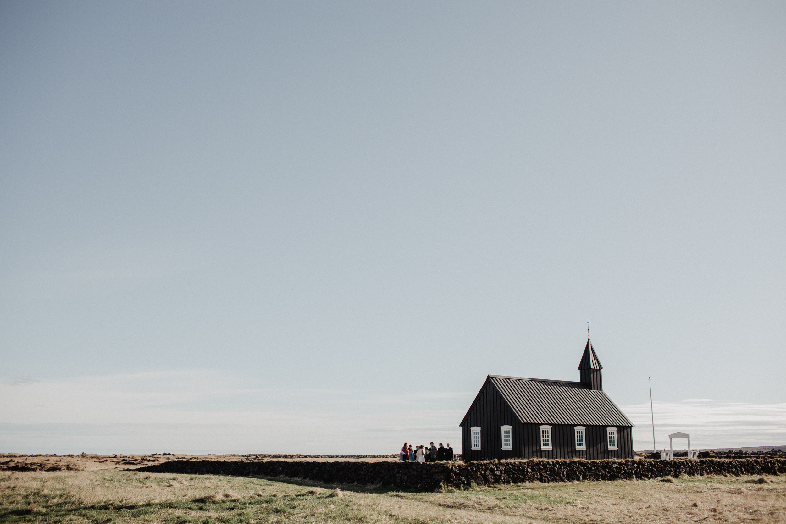 Wedding in Budir black church in Iceland. Iceland elopement photographer & videographer