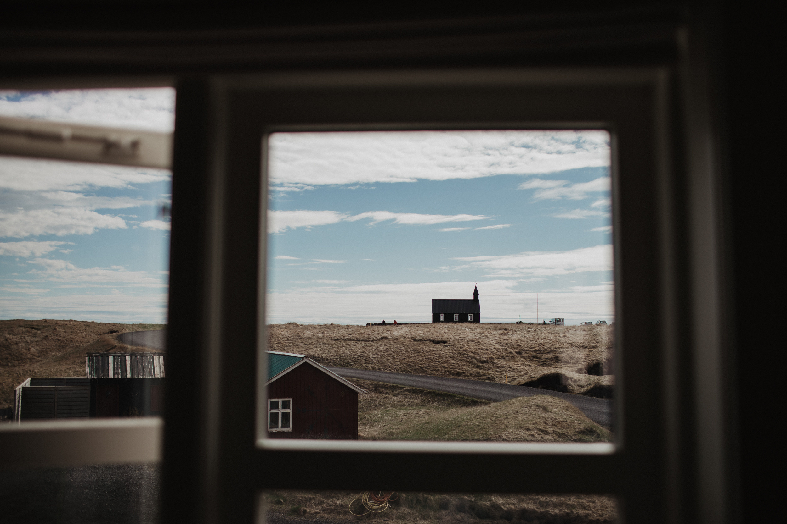 Wedding in Budir black church in Iceland. Iceland elopement photographer & videographer