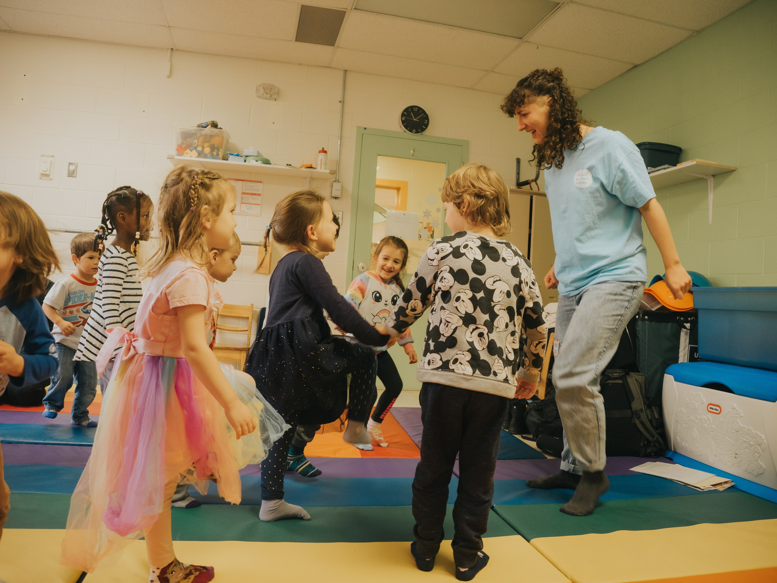 Children imitating their teacher, stomping to show anger.