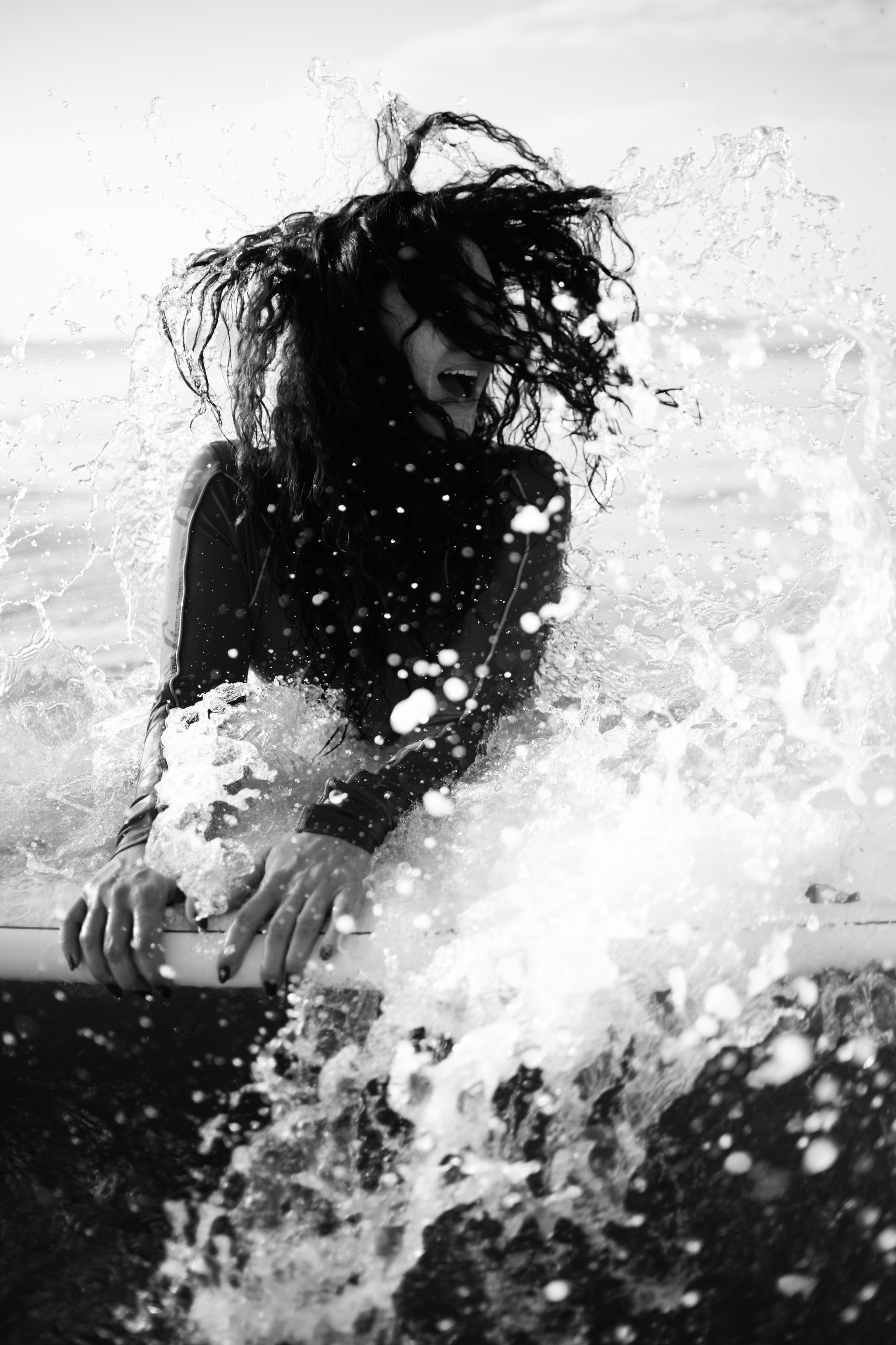 Photoshoot with a surfboard | BW