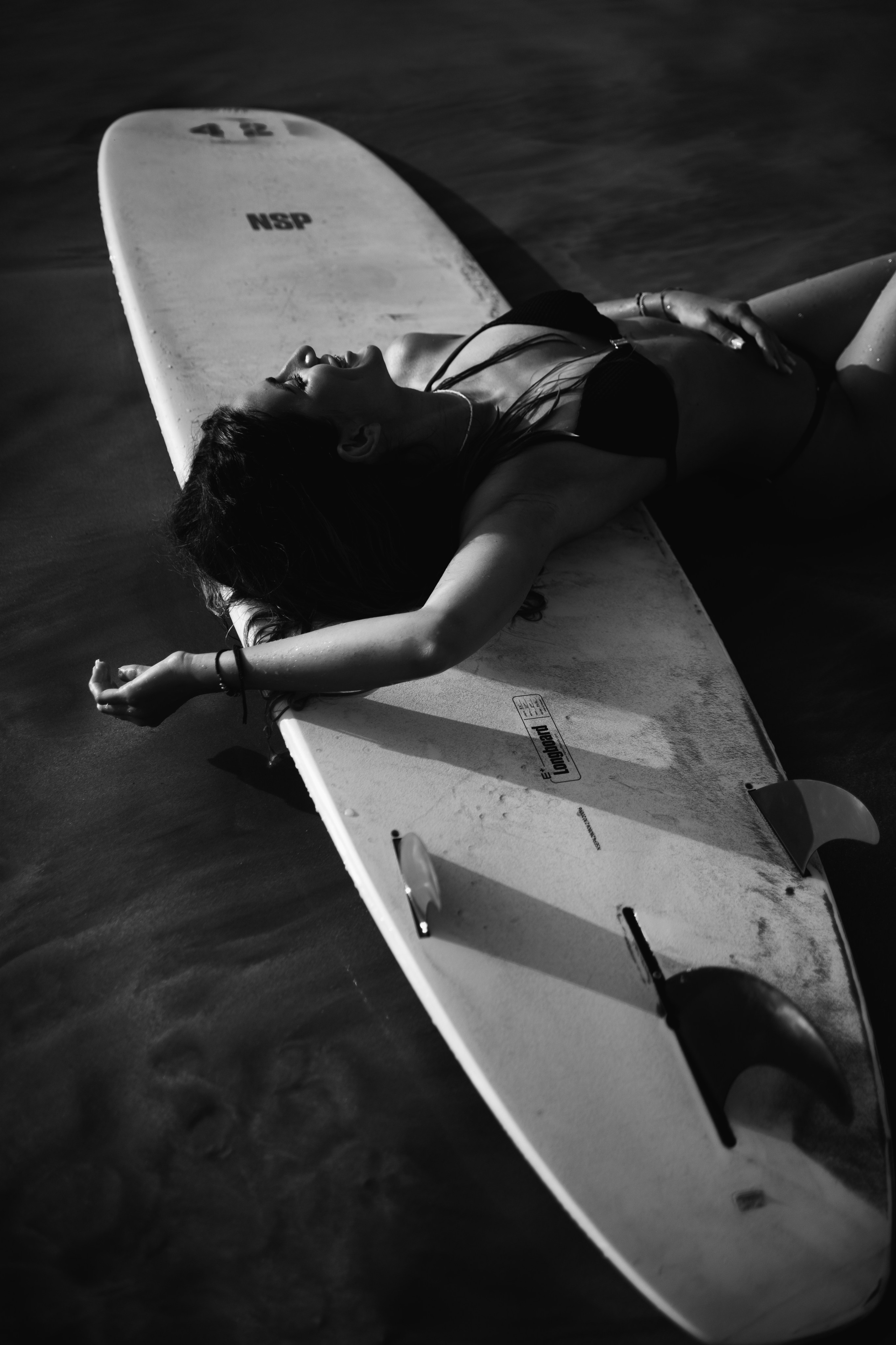 Photoshoot with a surfboard | BW