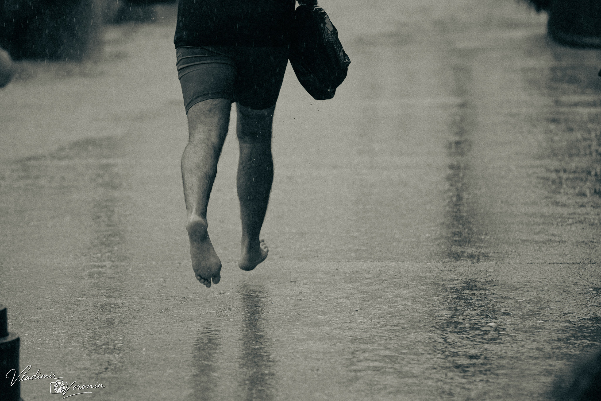 Rain in downtown. Photographer St. Augustine