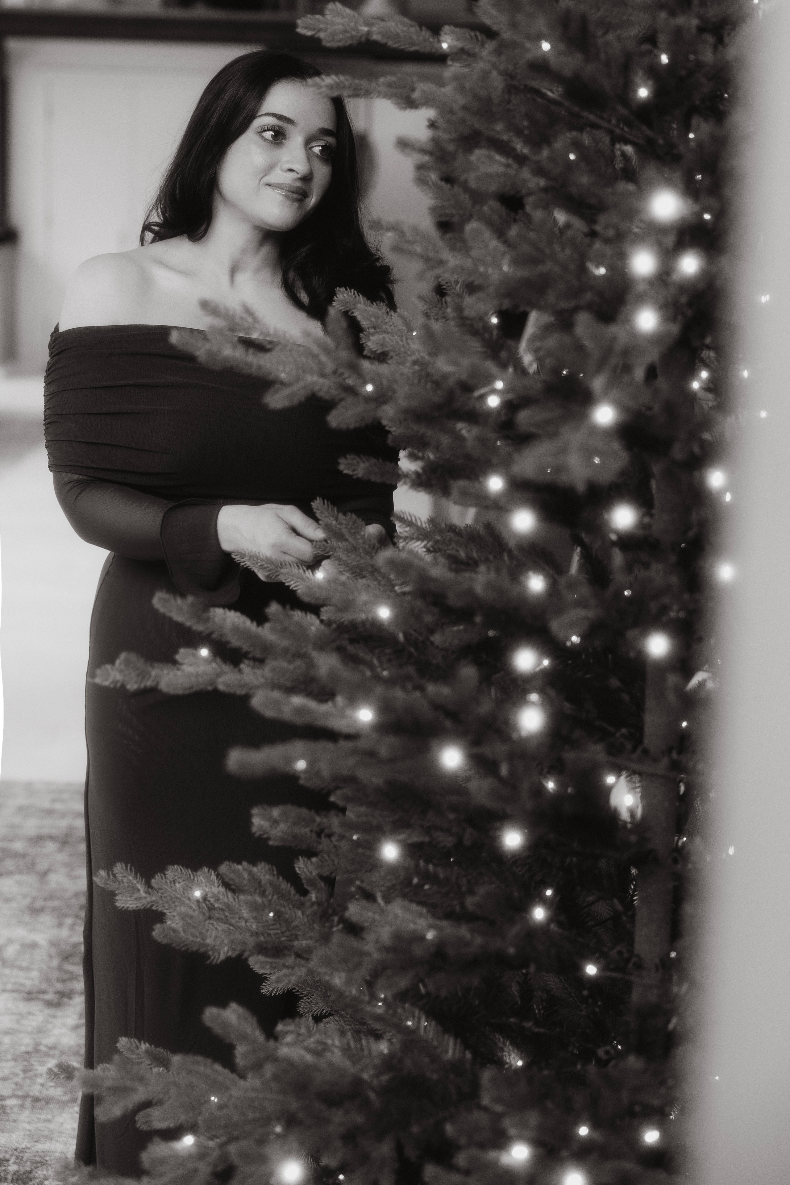 Family portraits with Christmas tree and vintage holiday props