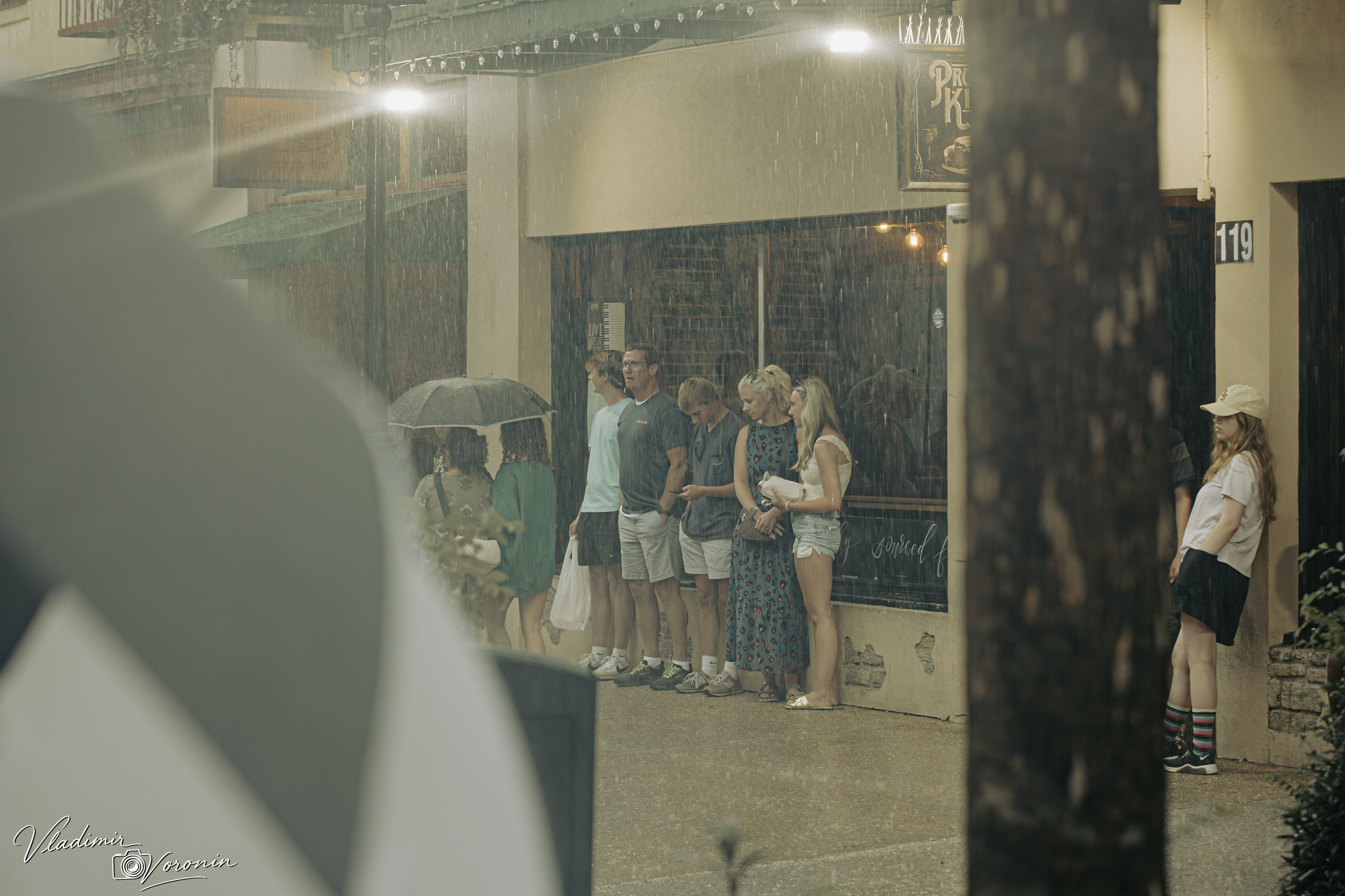 Rain in downtown. Photographer St. Augustine