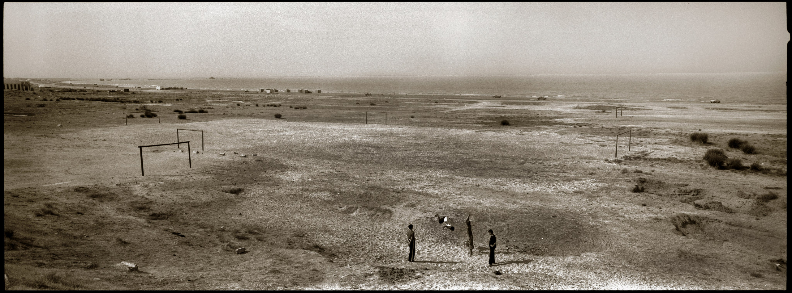 Playing by the sea. Sumgait, 2005
