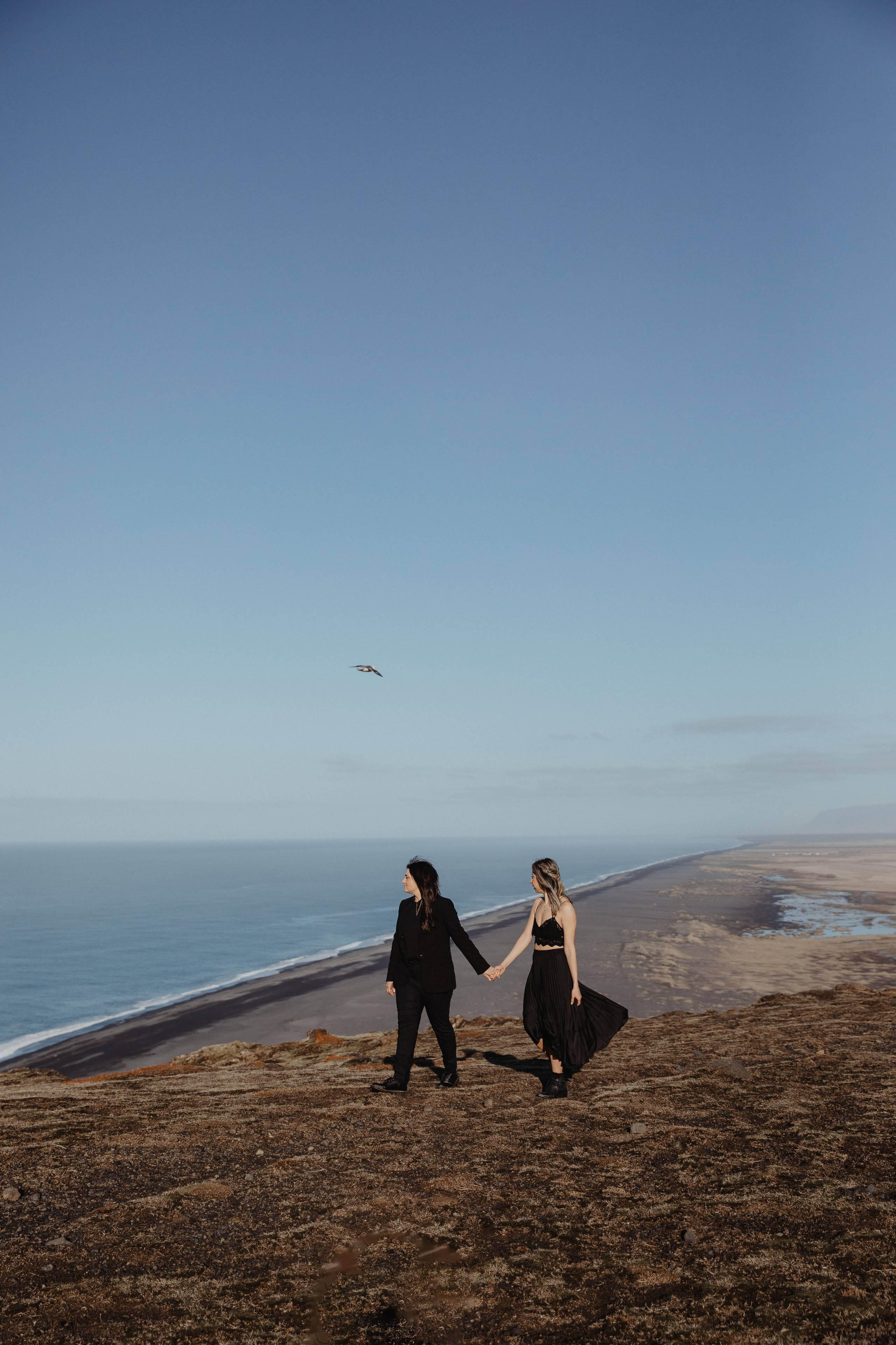 Same Sex Wedding at Iceland Black Sand Beach. Iceland elopement photographer & videographer