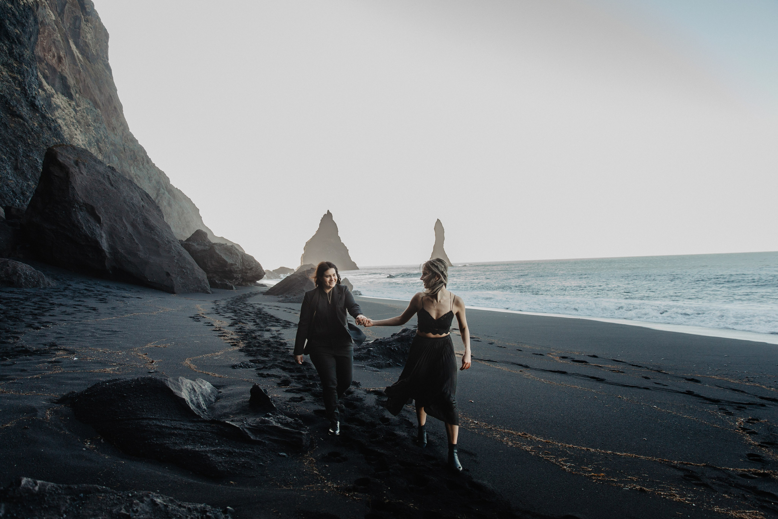 Same Sex Wedding at Iceland Black Sand Beach. Iceland elopement photographer & videographer