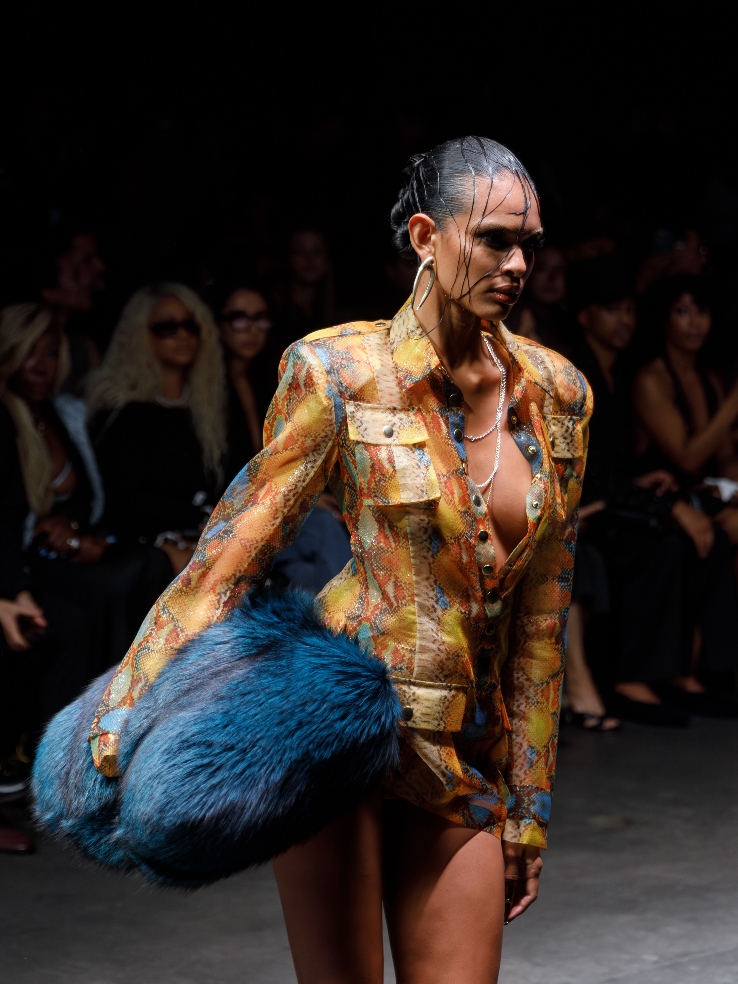 Runway model wearing brown textured dress – fashion week moment