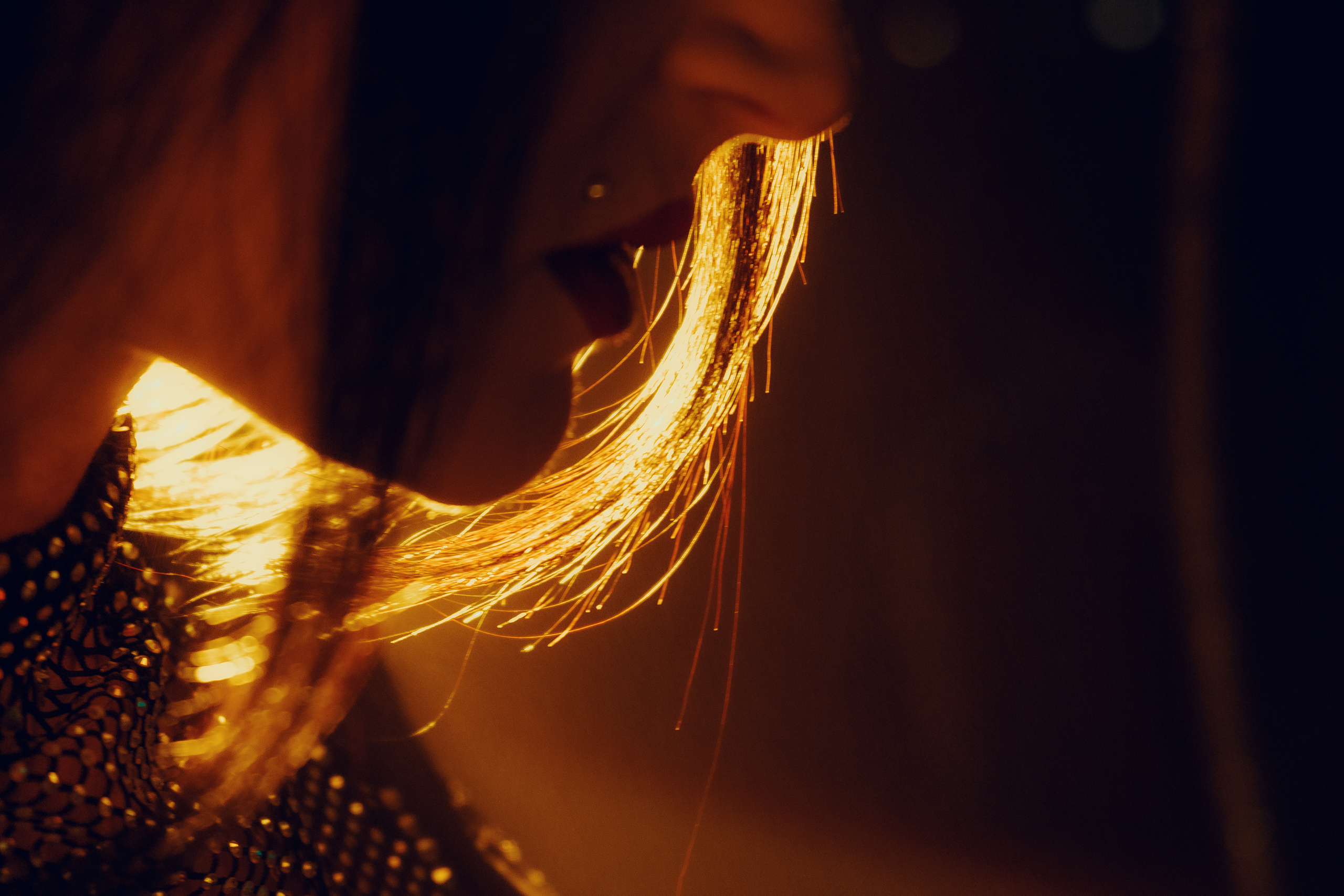 Glamorous photoshoot for a circus performer: motorcycle, fashion and dynamics